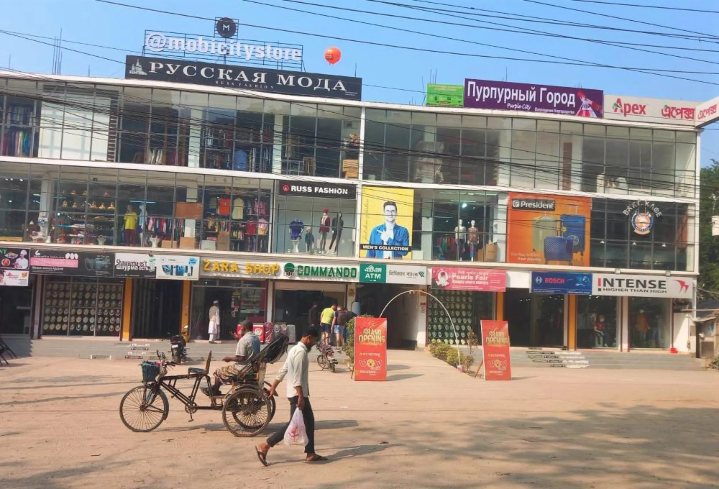 Local shops in the Rooppur area prominently feature Russian signboards to attract Russophone foreigners working at the site, Bangladesh, 17 December 2022