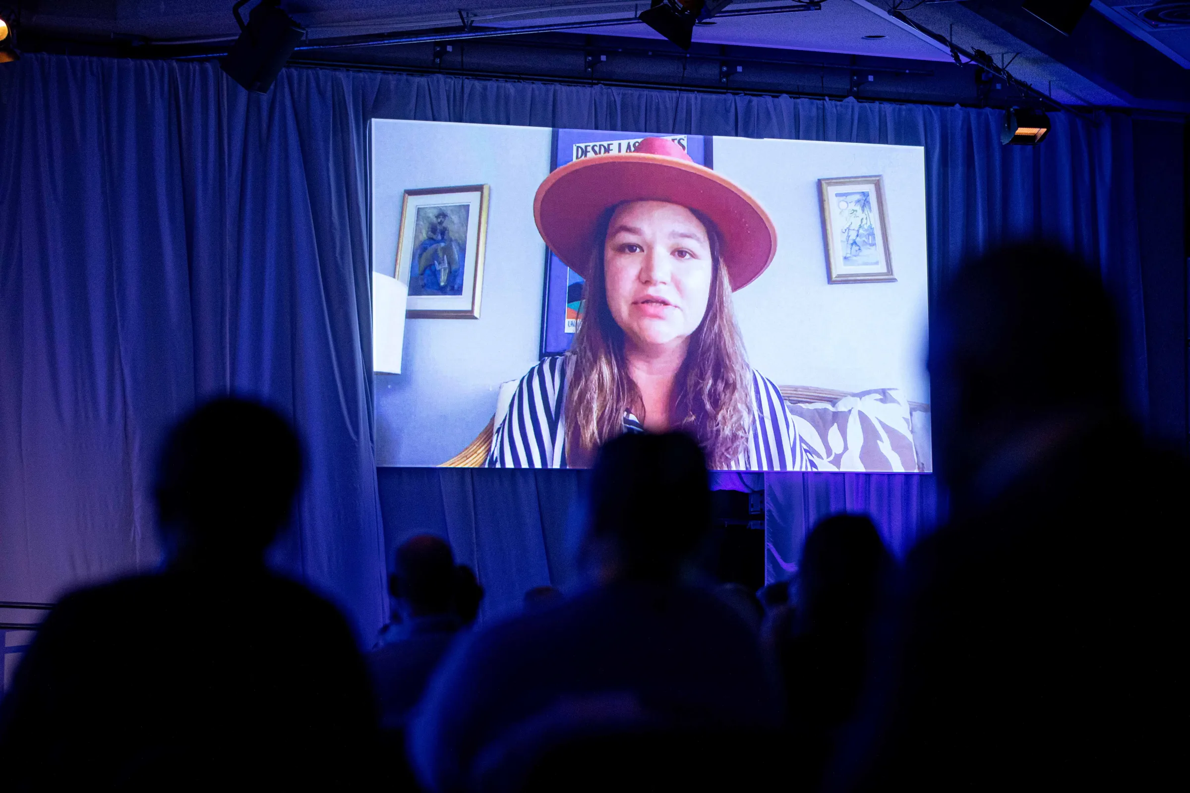Brittany Kaiser, co-founder of the Own Your Data Foundation, speaks via videocall during a panel at the 2022 Trust Conference, London, 26 October 2022. Thomson Reuters Foundation/Ed Telling