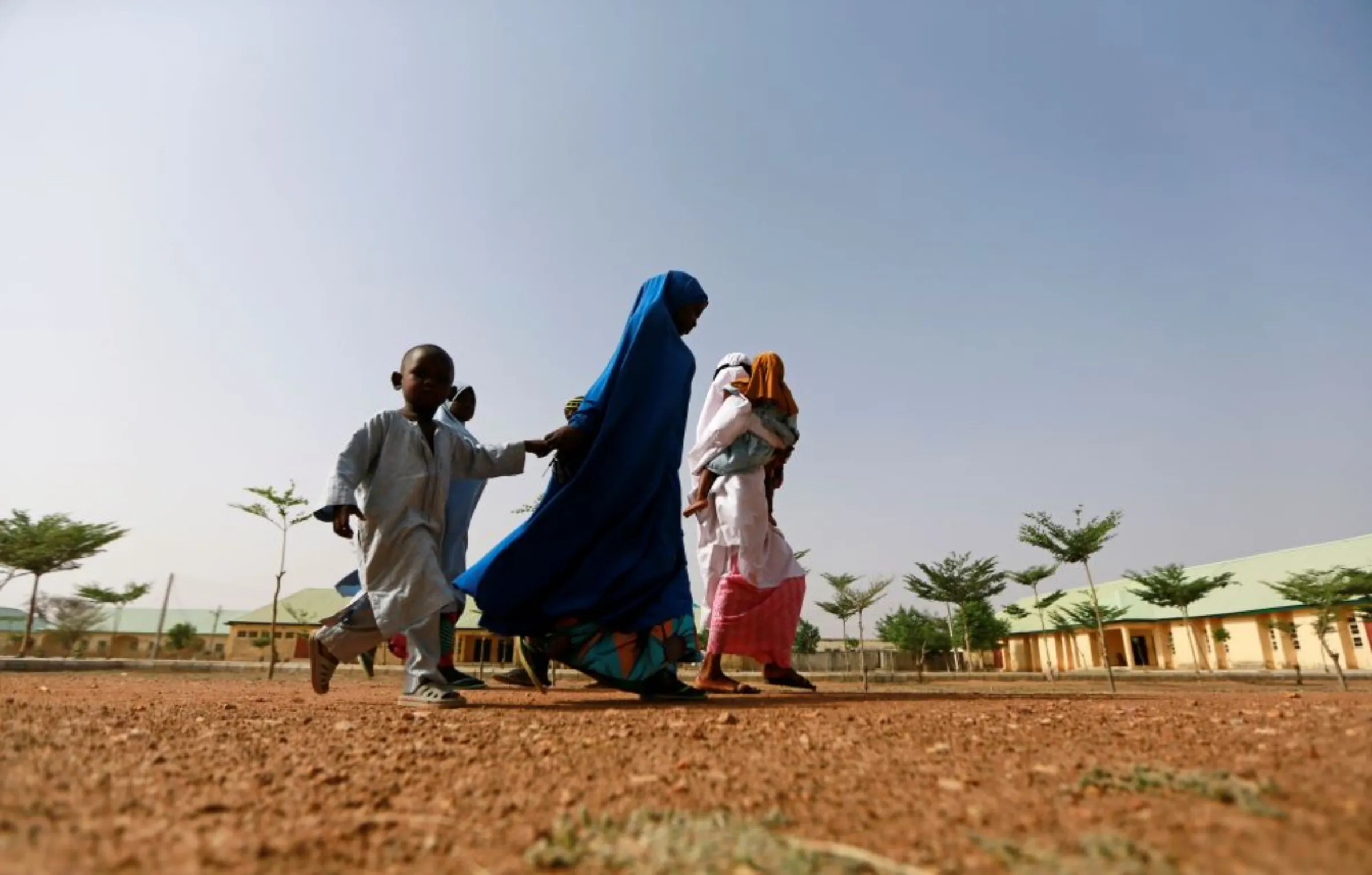 Mothers arrive at JSS Jangebe to collect their daughters following their release after they were kidnapped, in Jangebe, Zamfara, Nigeria March 3, 2021