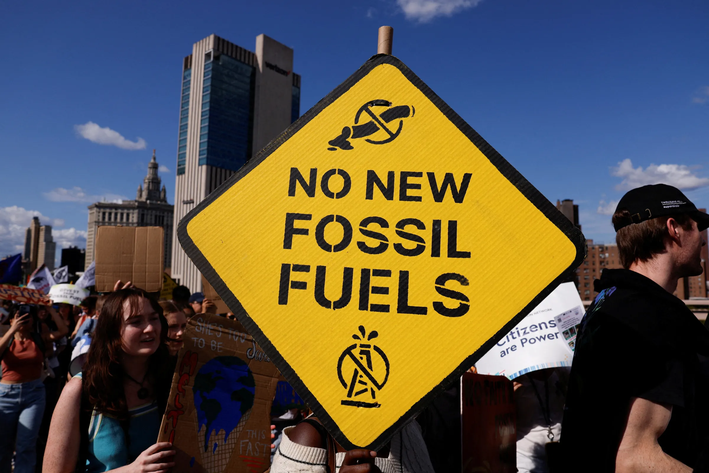 Demonstrators take part in rally calling to an end to the era of fossil fuels, as part of global day of action on 9/20 calling on Polluters, Funders, and Leaders to ditch fossil fuels, from Foley Square in New York City, U.S. September 20, 2024. REUTERS/Shannon Stapleton
