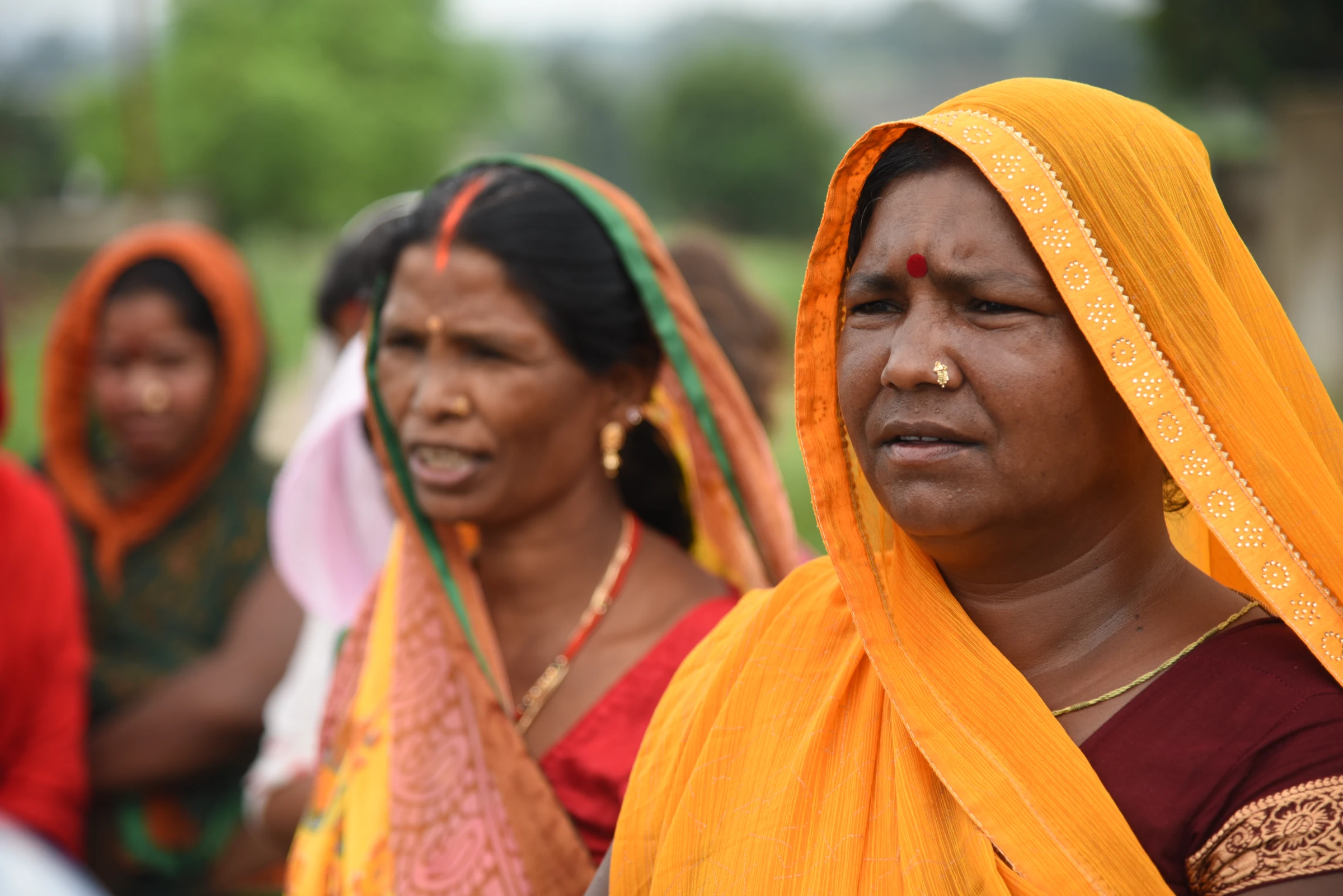 Sarita Kewat (right), a resident of Muher village has to soon give up her house for coal mining in Singrauli, India, on August 28, 2024. Thomson Reuters Foundation/Tanmoy Bhaduri