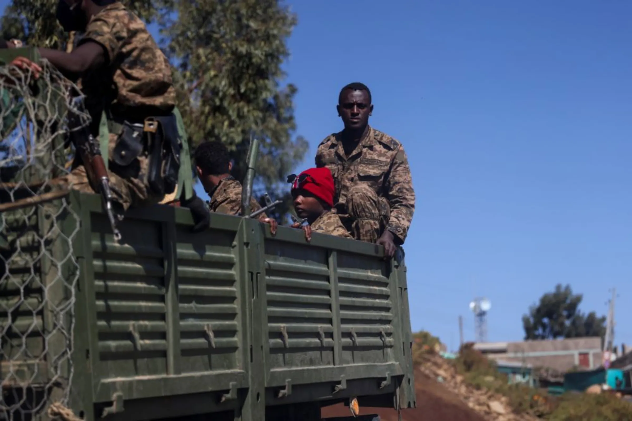 Ethiopian soldiers ride on a truck near the town of Adigrat, Tigray region, Ethiopia, March 18, 2021