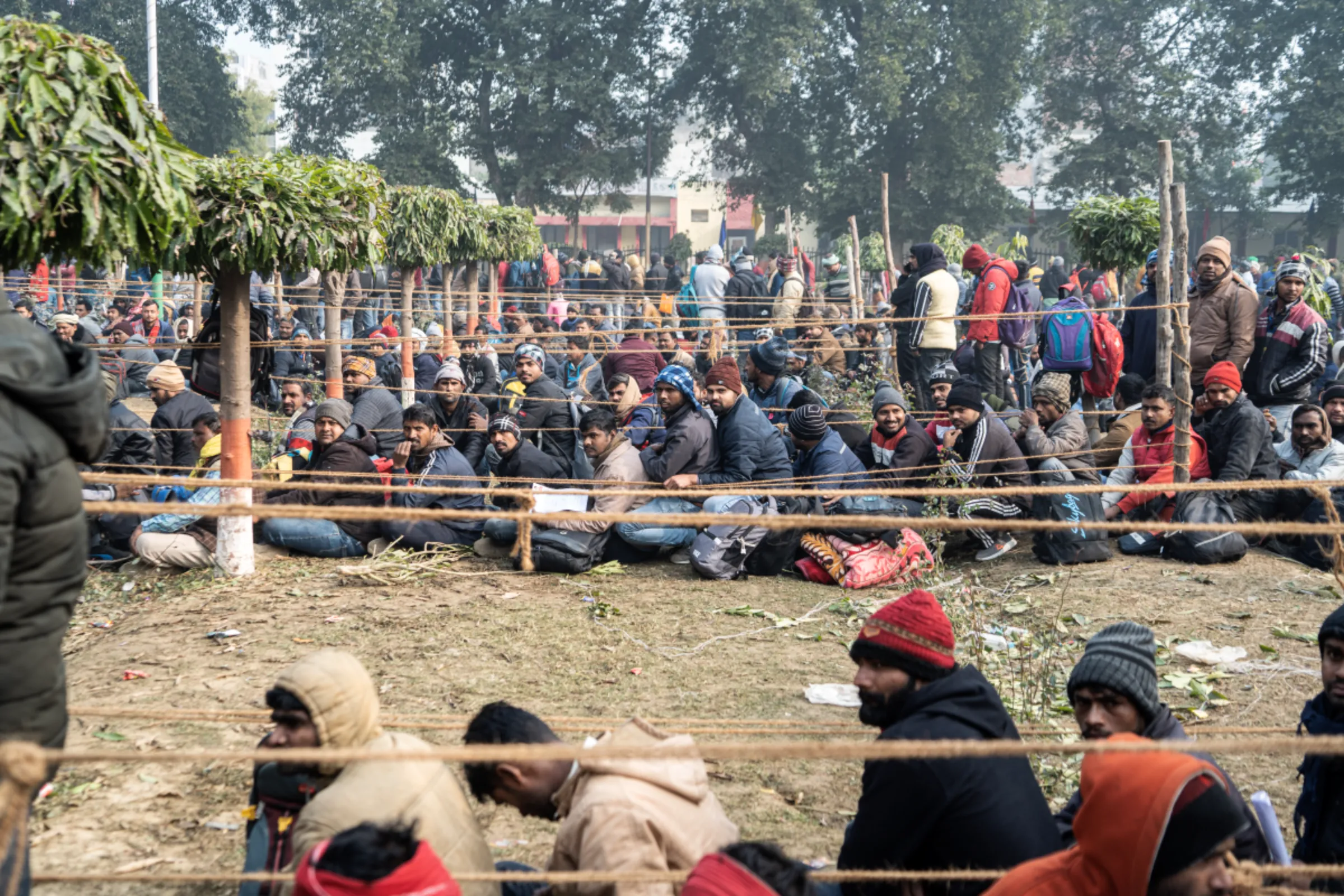 Indian workers wait for practical tests at the recruitment center in Lucknow on Monday, January 29. After 5000 workers were selected, other states in India have requested a similar recruitment drive, officials say. Thomson Reuters Foundation//Ahmer Khan