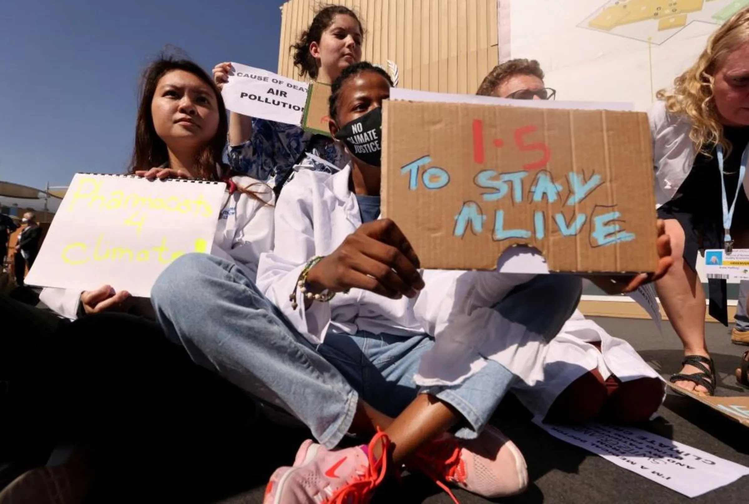 Activists protest at the Sharm El-Sheikh International Convention Centre, during the COP27 climate summit, in Sharm el-Sheikh, Egypt, November 11, 2022