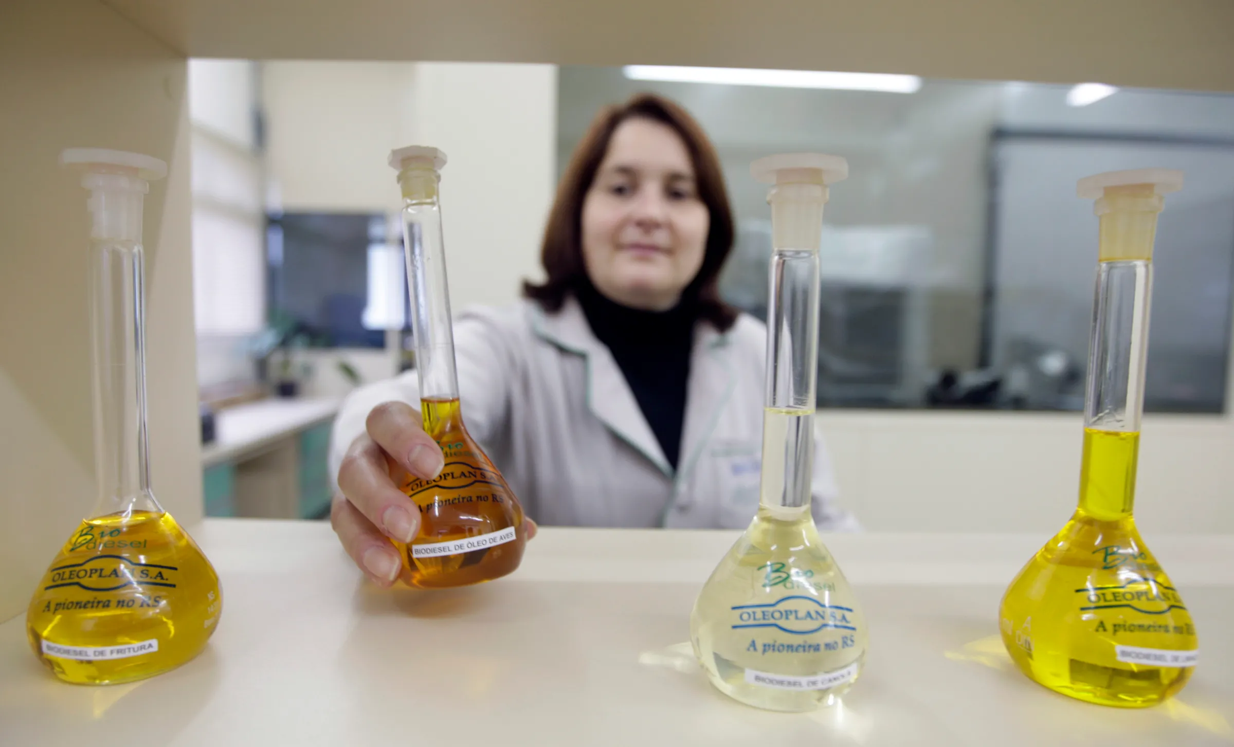A chemical engineer checks a flask of biofuel at Oleoplan factory in Passo Fundo, southwest of Porto Alegre, May 21, 2010.  REUTERS/Bruno Domingos
