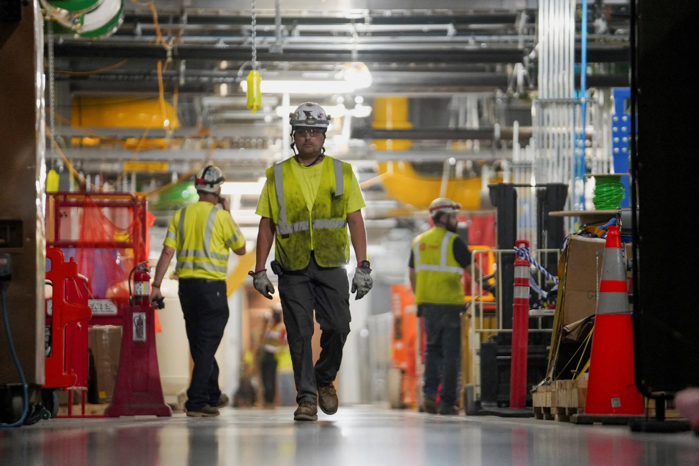 People work inside the Microsoft data center campus' Graphical Processing Unit, currently under construction in Mount Pleasant, Wisconsin, U.S., September 18, 2025. REUTERS/Audrey Richardson
