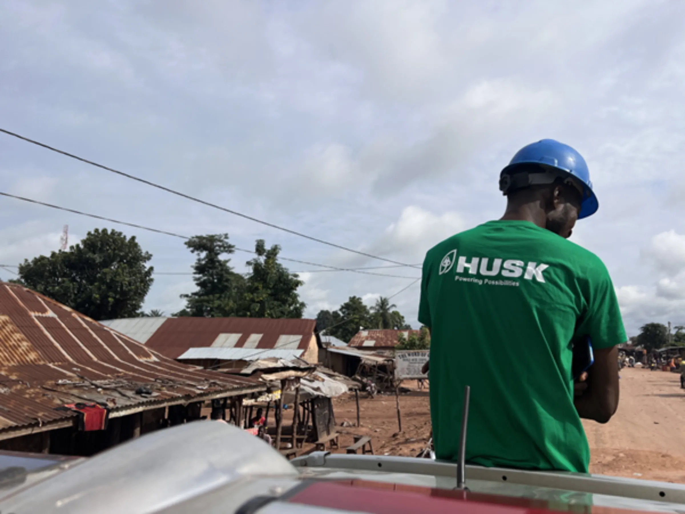 A Husk Power employee is pictured in the street in Igbabo, Nasarawa, Nigeria, September 27, 2022. Thomson Reuters Foundation/Afolabi Sotunde