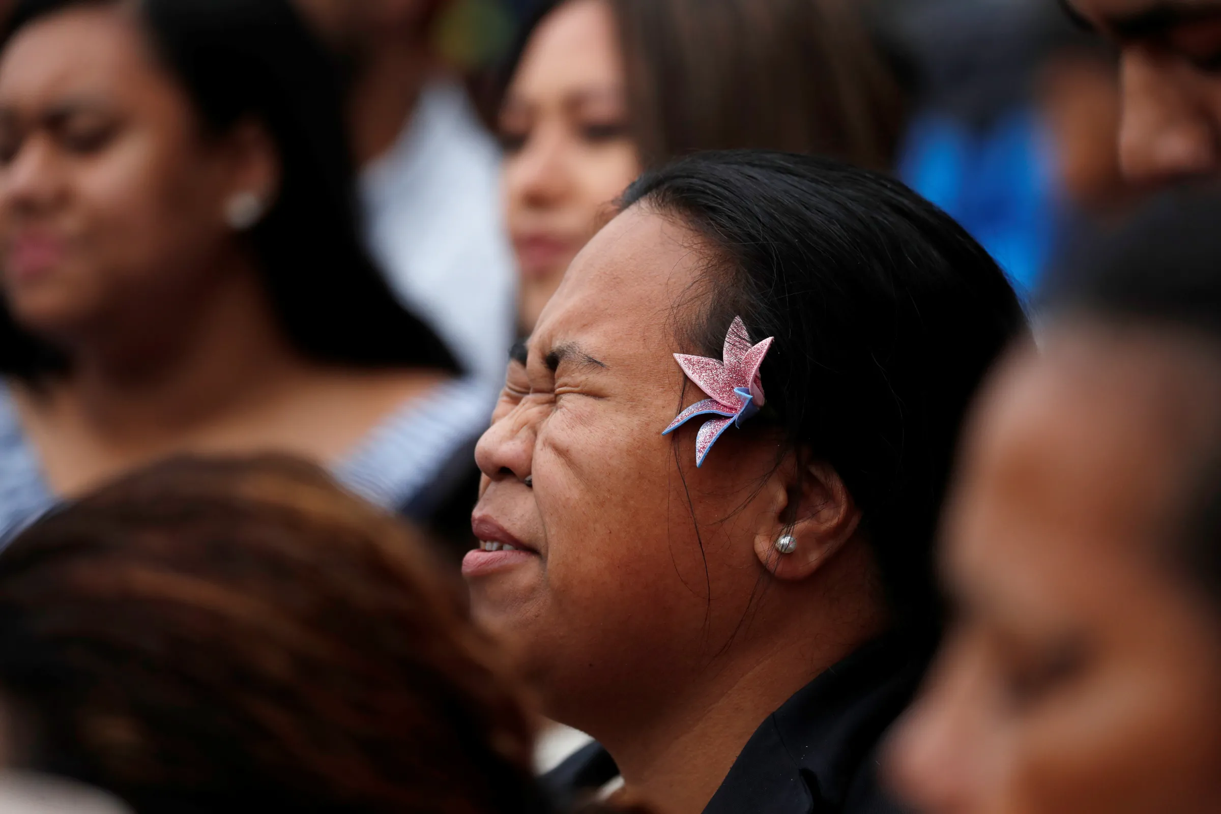 A member of the Maori community reacts near Masjid Al Noor mosque in Christchurch, New Zealand, March 17, 2019. REUTERS/Jorge Silva