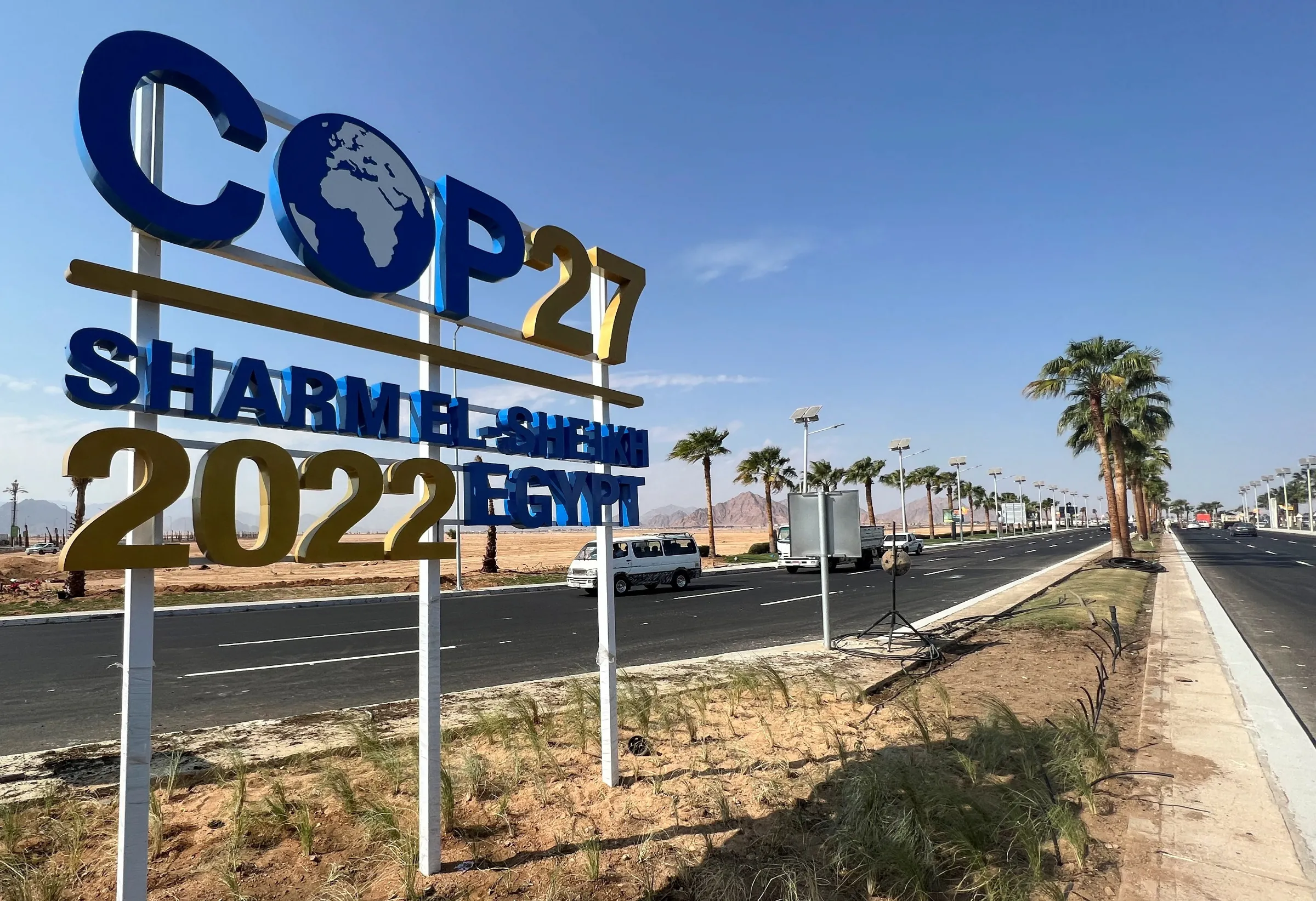 View of a COP27 sign on the road leading to the conference area in Egypt's Red Sea resort of Sharm el-Sheikh town as the city prepares to host the COP27 summit next month, in Sharm el-Sheikh, Egypt October 20, 2022