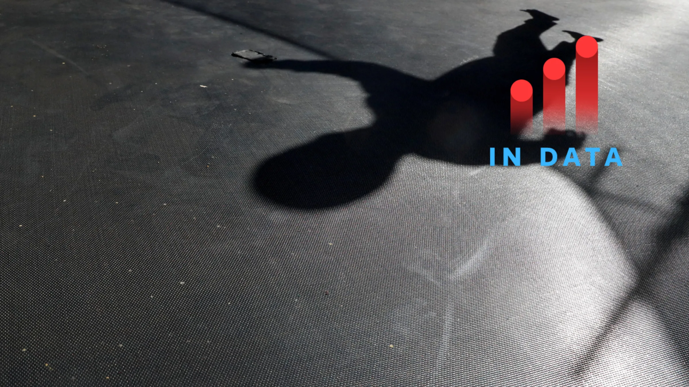 The shadow of a child is cast as he plays on a trampoline in Nairobi, Kenya February 12, 2025. REUTERS/Thomas Mukoya