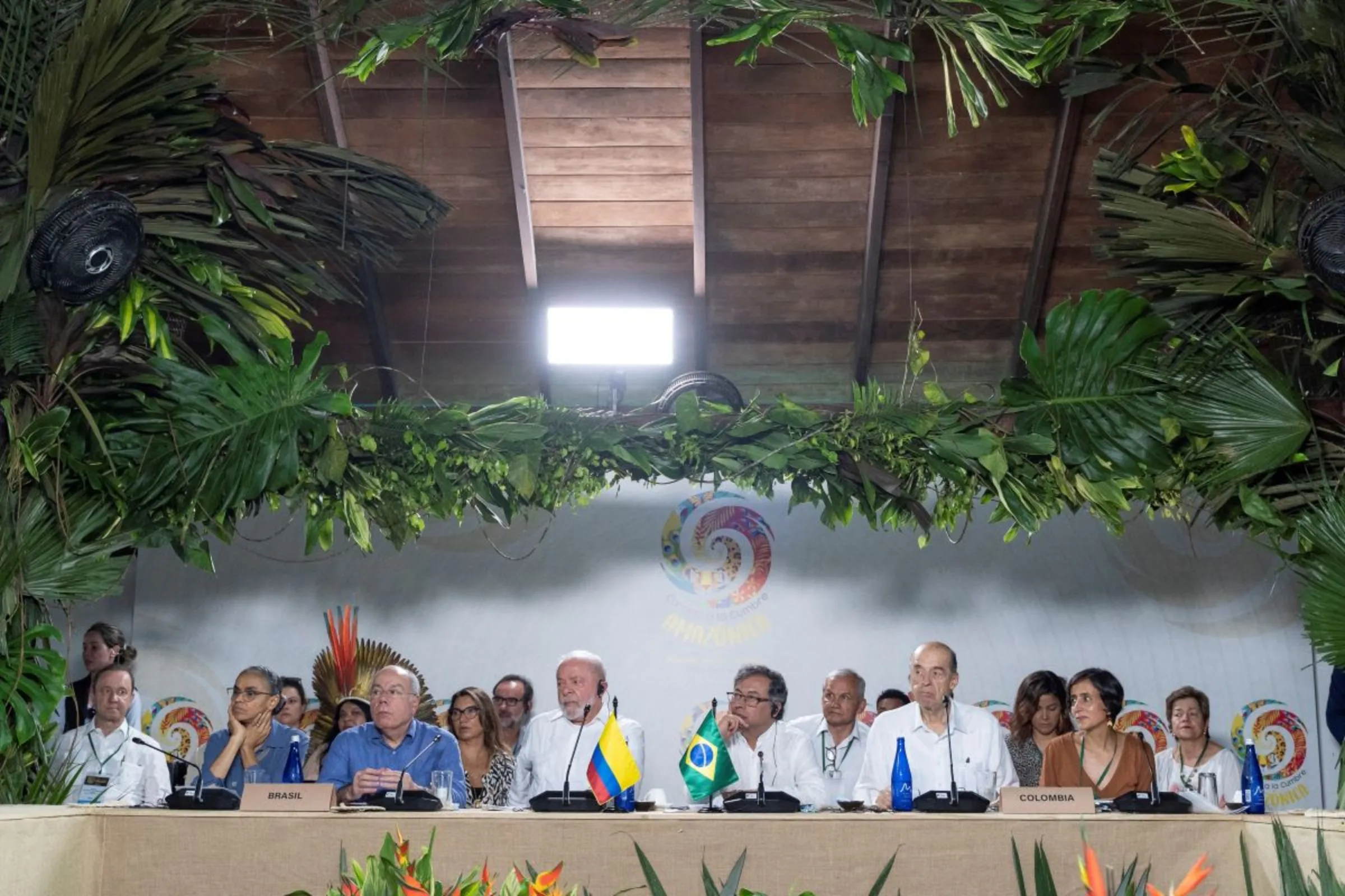 Colombian President Gustavo Petro and Brazilian President Luiz Inacio Lula da Silva, accompanied by members of their government cabinet attend the event 'Road to the Amazon Summit' in Leticia, Colombia July 8, 2023. Colombian Ministry of Foreign Affairs/Handout via REUTERS