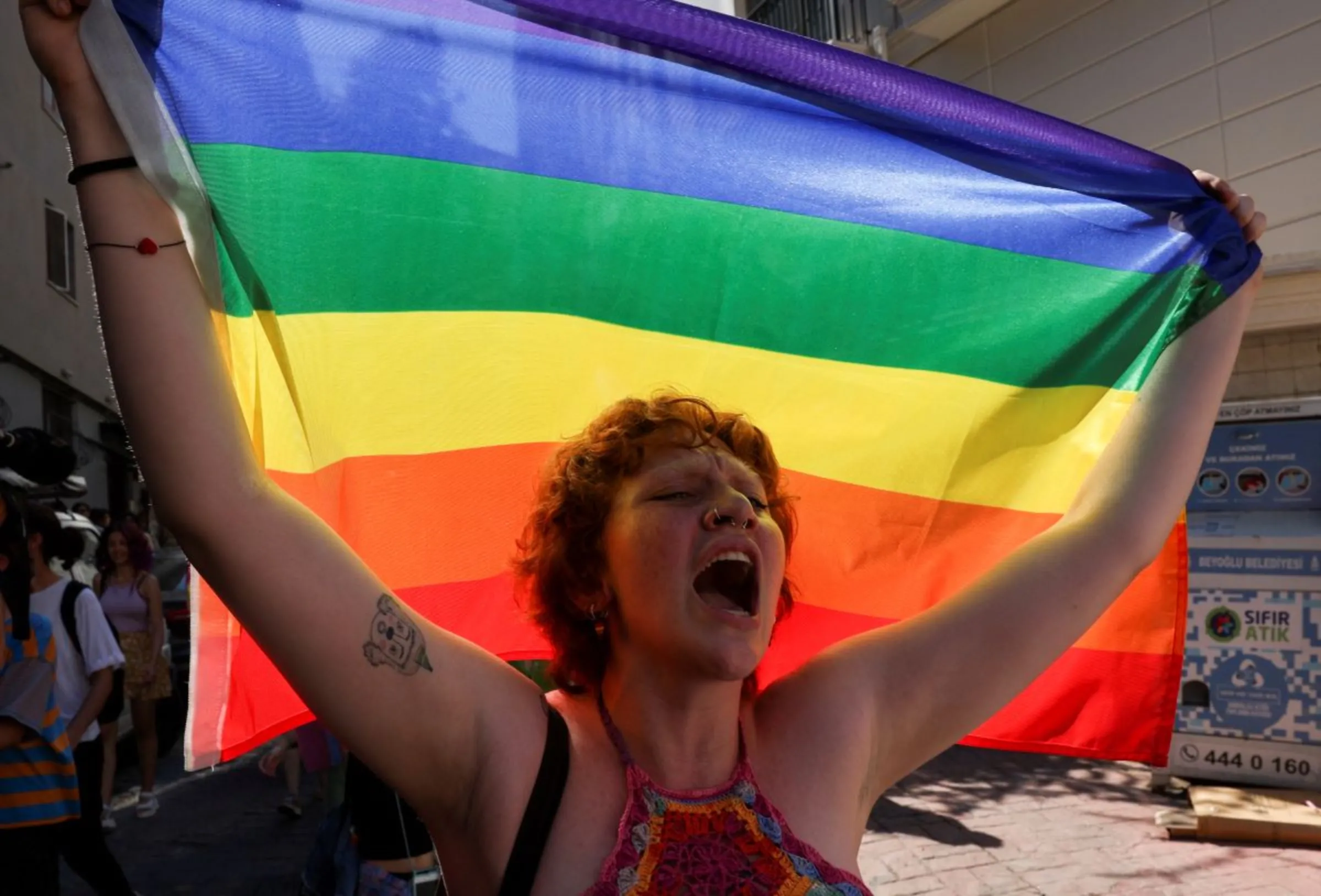 Demonstrators march as they try to gather for a pride parade, which was banned by local authorities, in central Istanbul, Turkey June 26, 2022. REUTERS/Umit Bektas