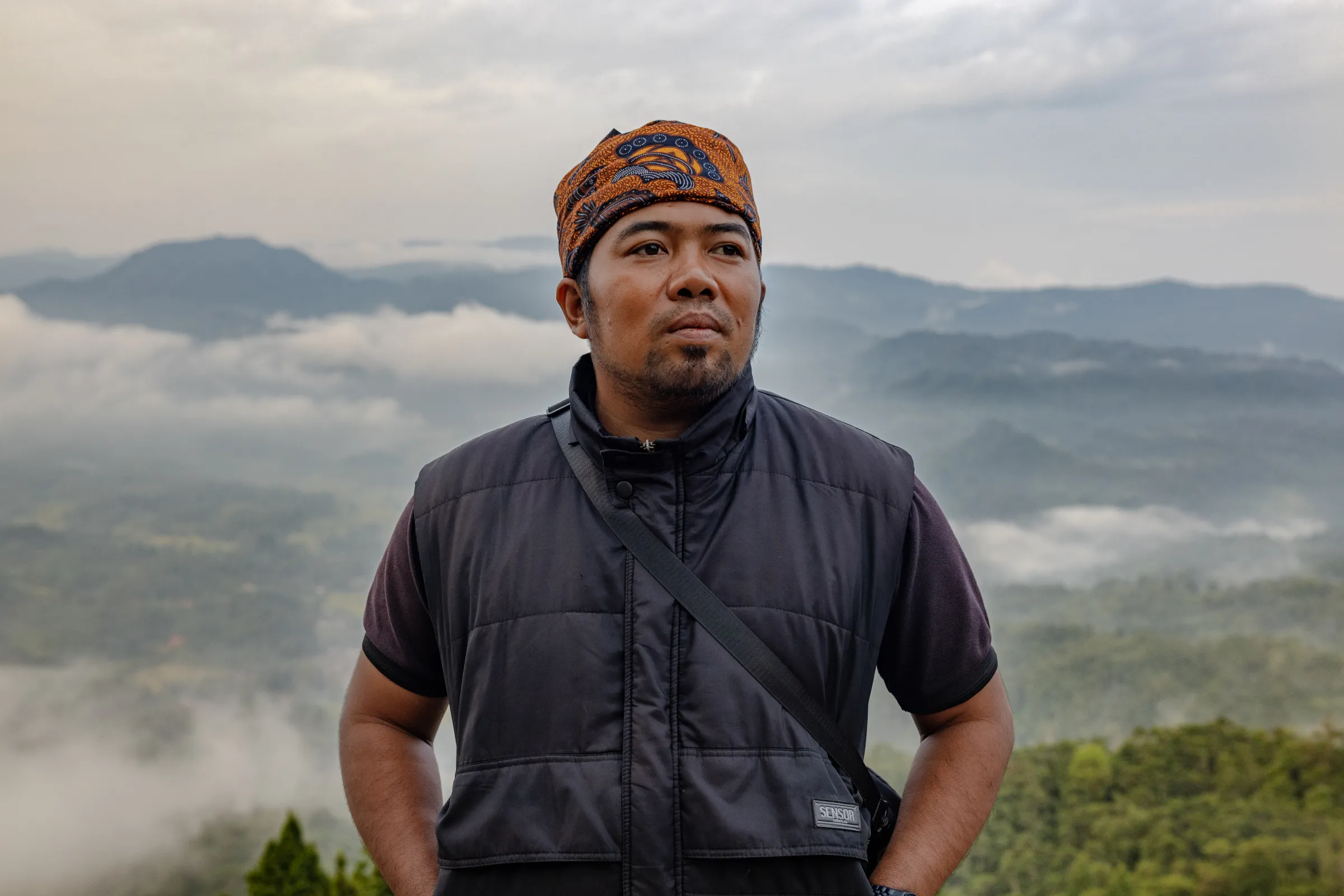 Sukmadi Jaya Rukmana, a 41-year-old tourism advocate and anti-mining activist, poses in Citorek Kidul, Banten, Indonesia, July 14, 2025. Thomson Reuters Foundation/Yudha Baskoro