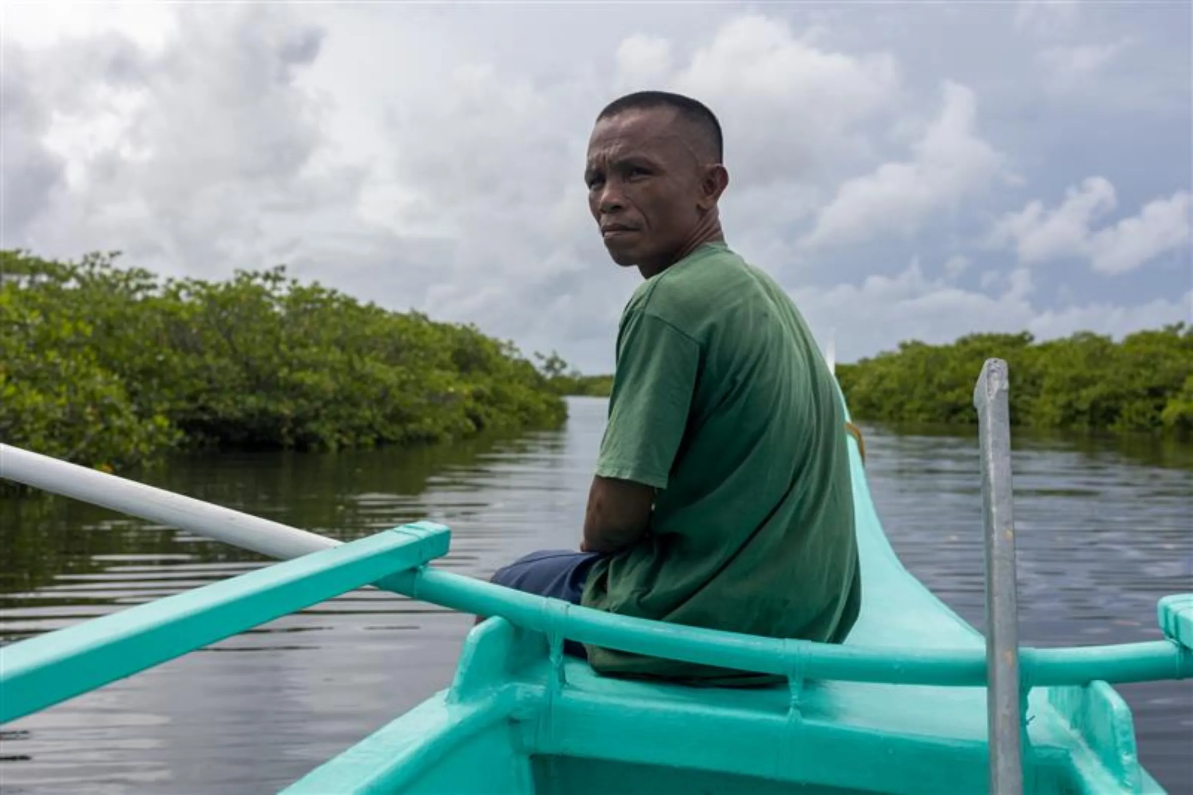 Junrey Longos is a local tour guide and fisherman in Del Carmen. Eco-tourism has boosted the income of the local community in Del Carmen. March 4, 2025. Kathleen Lei Limayo/Thomson Reuters Foundation