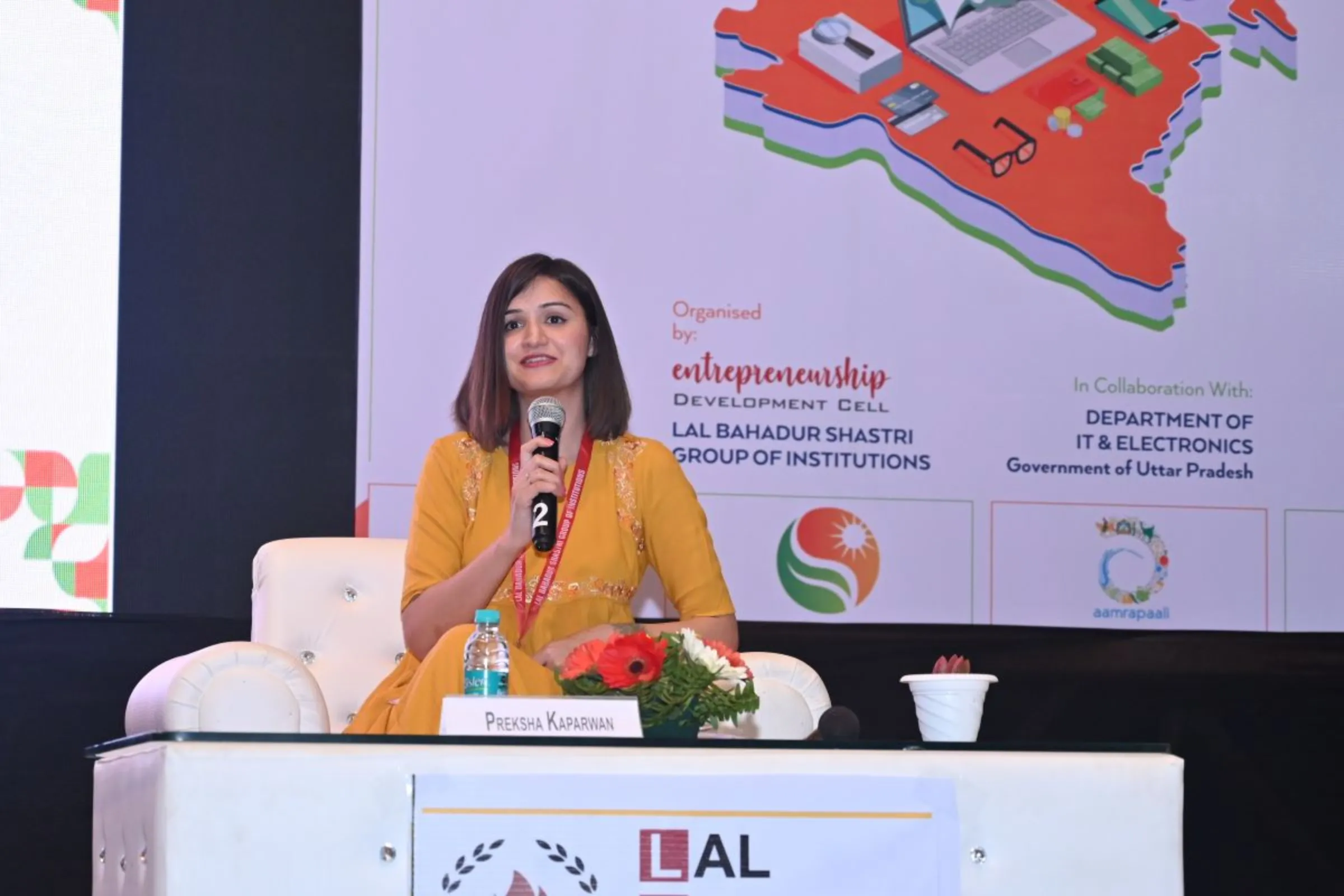 Preksha Kaparwan, co-founder of Alphaa AI and Super AI, speaking about entrepreneurship in Lucknow, Uttar Pradesh at an event organized by the government in early 2020. SuperAI/Handout via Thomson Reuters Foundation