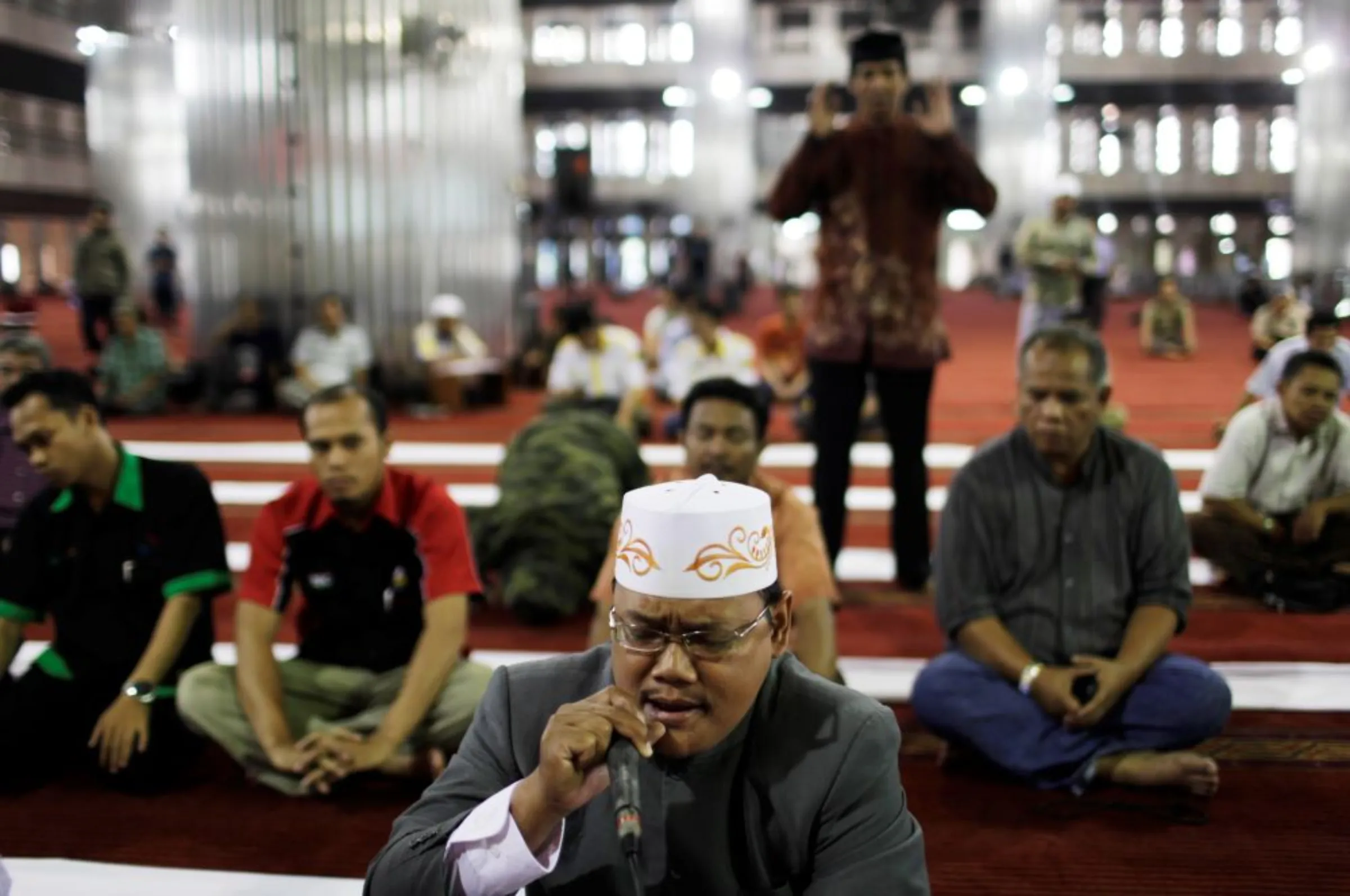 A man reads the Koran