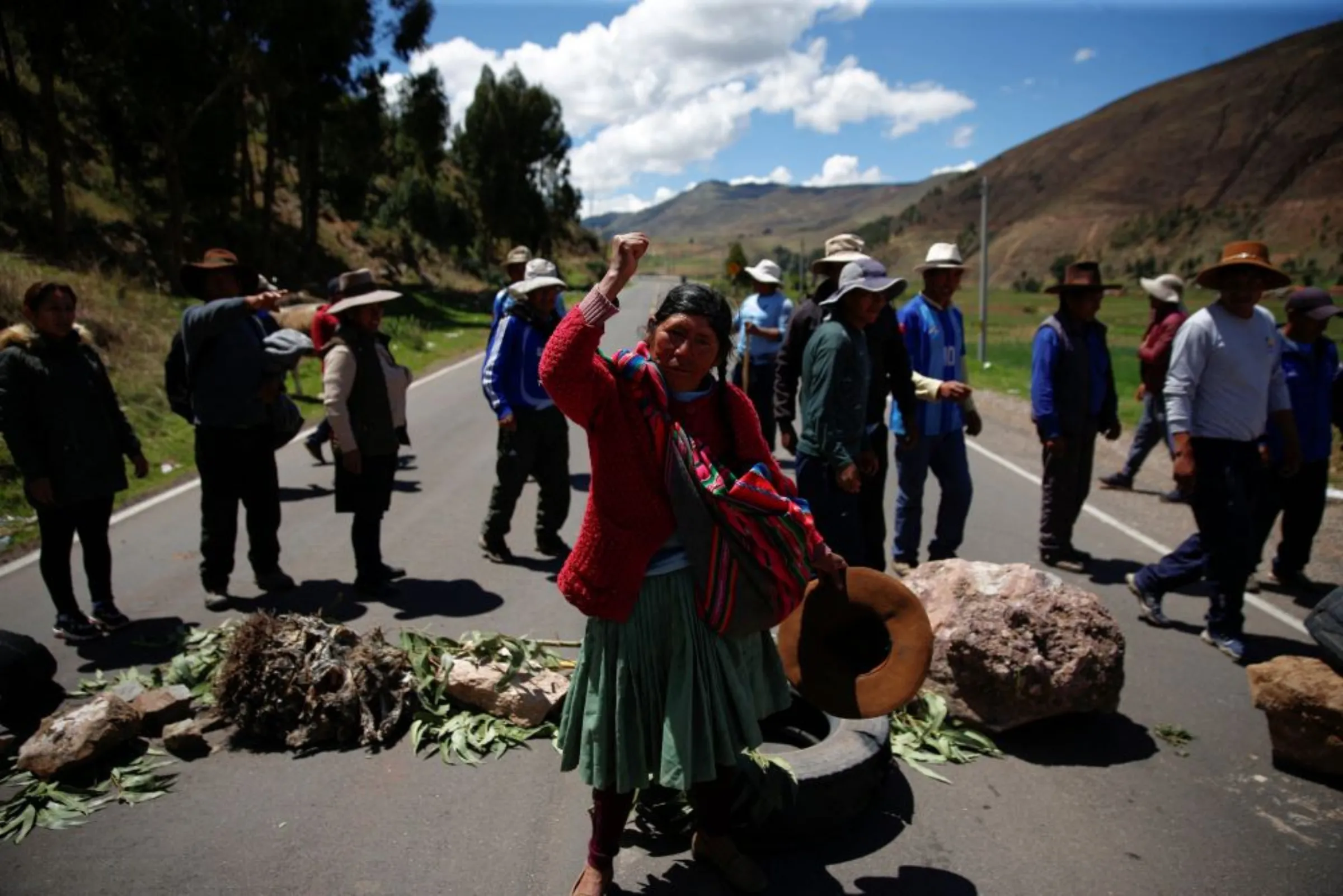 A Peruvian demonstrator gestures demanding early elections and the release of Peruvian ousted leader Pedro Castillo on a highway blockade, in Cusco, Peru January 7, 2023