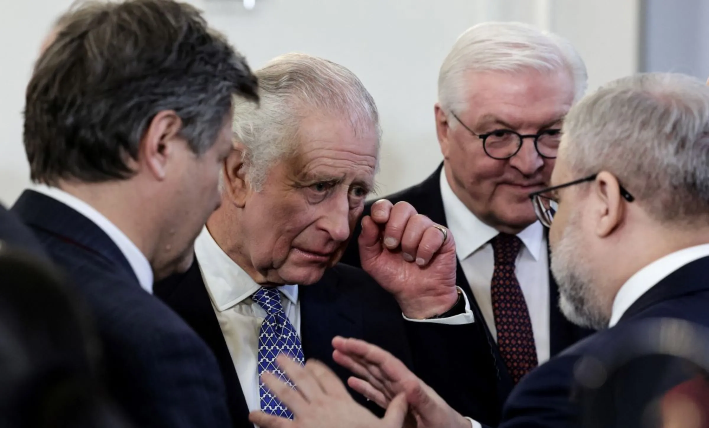 Britain's King Charles III (2L) and German President Frank-Walter Steinmeier talk to guests including German Minister of Economics and Climate Protection Robert Habeck (L) during a Green Energy Reception at the presidential Bellevue Palace in Berlin, on March 29, 2023. Jens Schlueter/Pool via REUTERS
