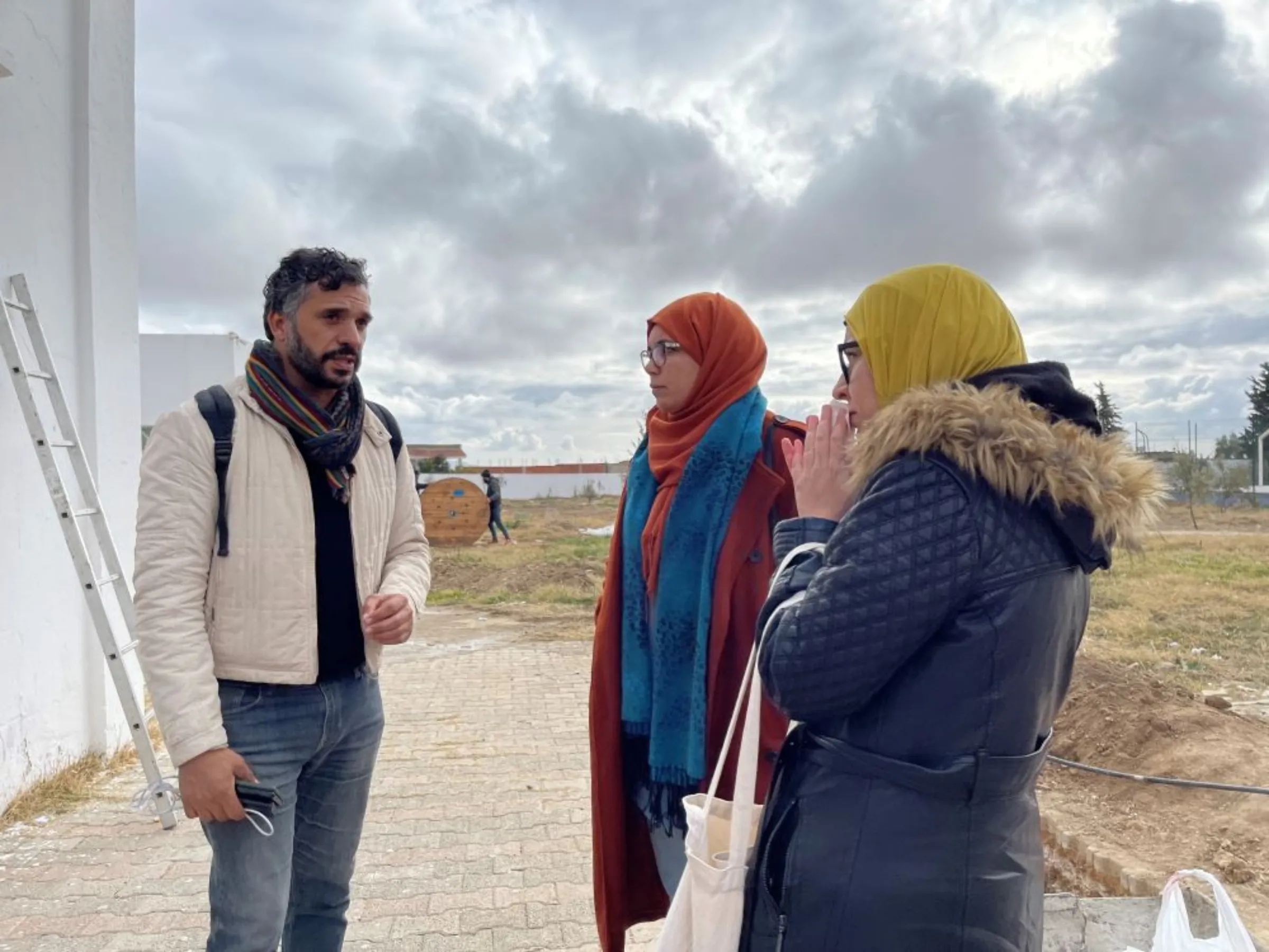 Lotfi Hamadi, founder of 'Wallah We Can', speaks to government advisors at the Makthar school in Siliana, northern Tunisia, February 3, 2023