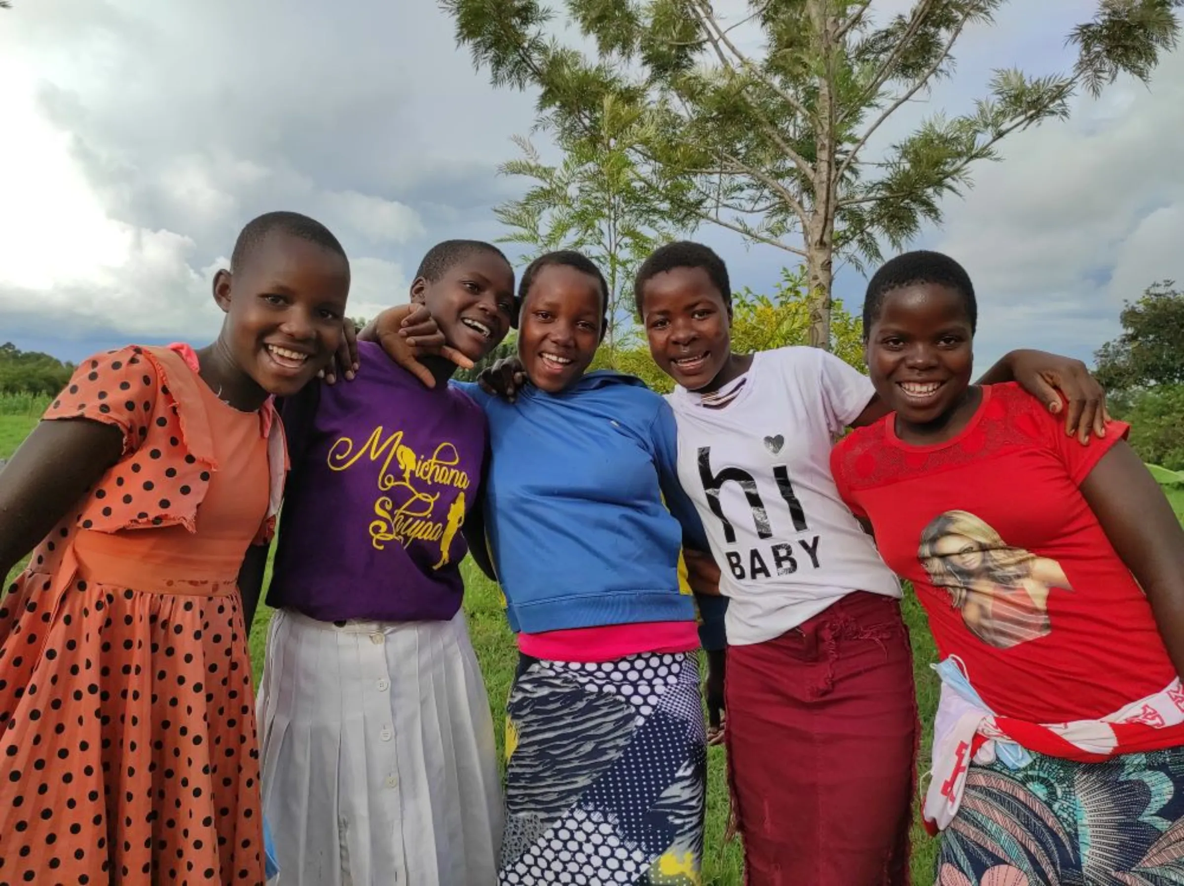 Five girls attend a workshop on ending FGM in Kuria, western Kenya, hosted by Msichana Empowerment Kuria, a grassroots Kenyan organisation, on July 20, 2022