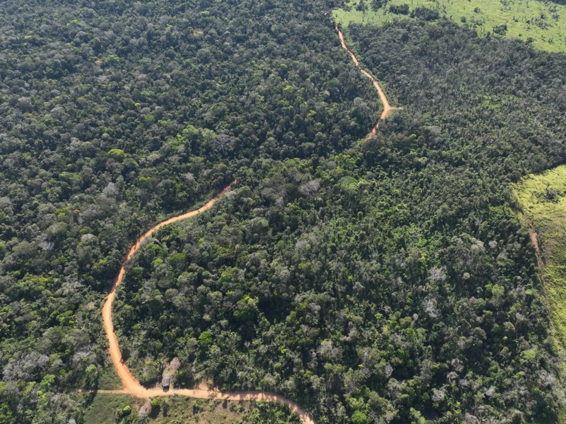 Aerial view of a road that goes through Florestal Santa Maria, a conservation project in Colniza, in the state of Mato Grosso, Brazil, May 30, 2022