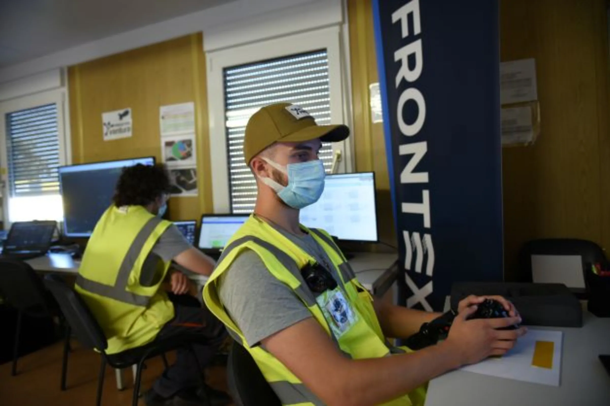 A staff member of European Union's border agency FRONTEX operates an aerostat balloon system equipped with high tech surveillance cameras, in Alexandroupolis, Greece, August 10, 2021. REUTERS/Alexandros Avramidis