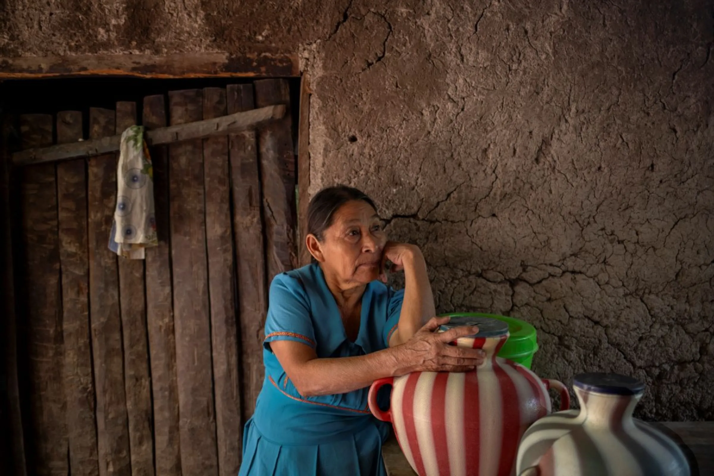 Monica Ramirez de Leon, a subsistence maize and bean farmer, in her adobe home in a hamlet in the Camotán municipality in the province of Chiquimula, Guatemala, September 8, 2023. Thomson Reuters Foundation/Fabio Cuttica