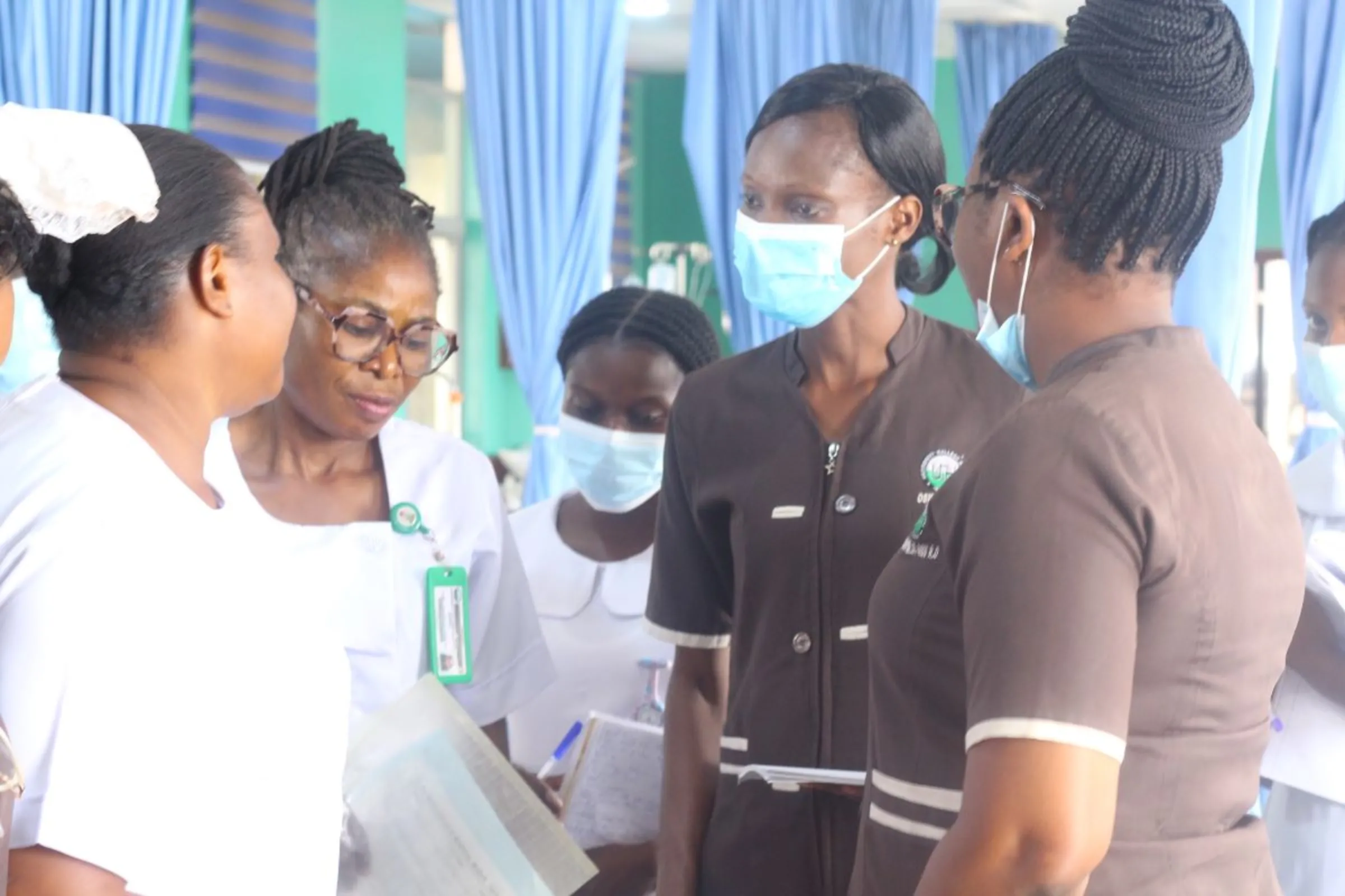 Nurses during a ward round at the University Teaching College Hospital, Ibadan in Nigeria on May 8, 2023. Bukola Adebayo/Thomson Reuters Foundation