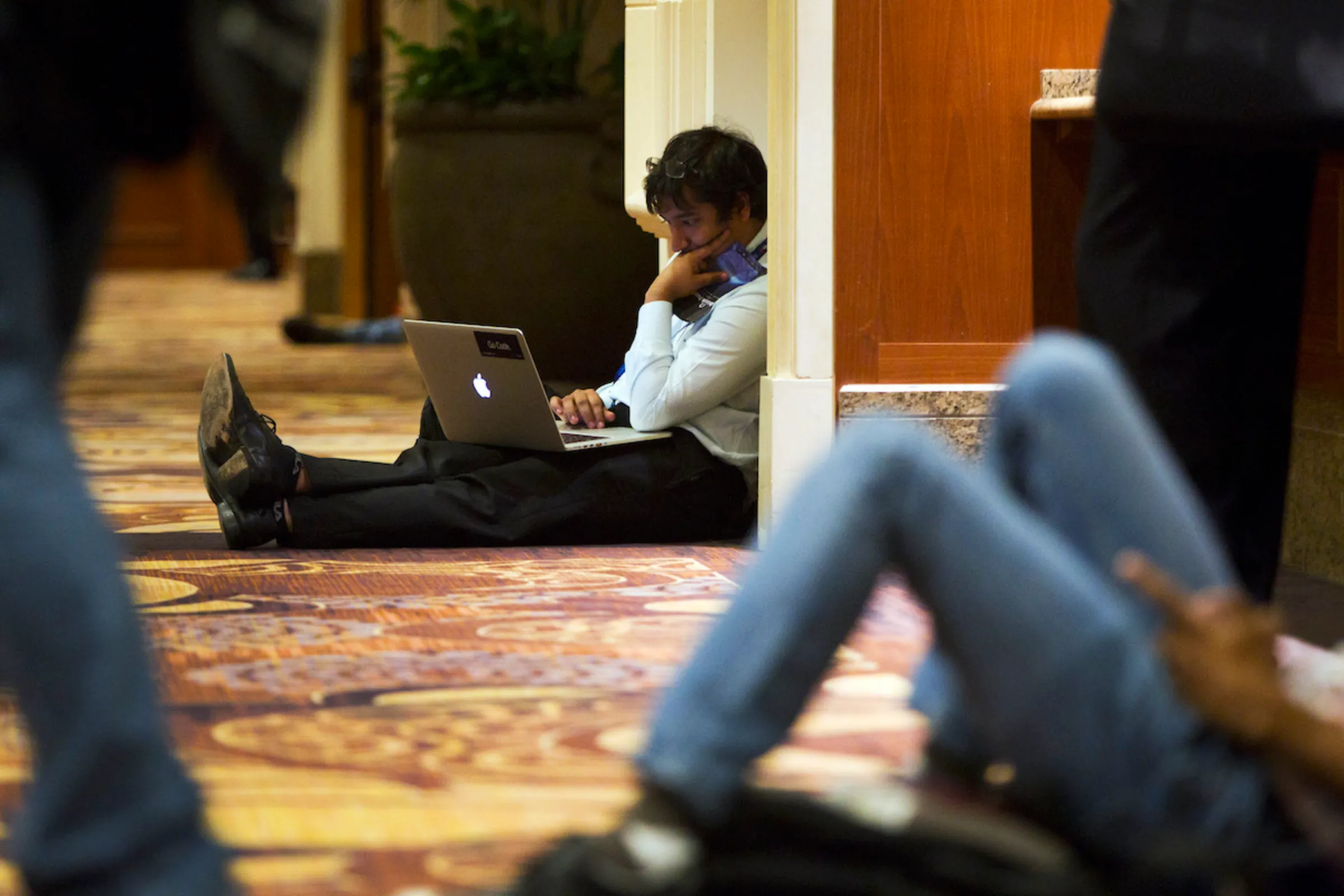 A security engineer at Google, works in a hallway during the Black Hat USA 2014 hacker conference at the Mandalay Bay Convention Center in Las Vegas, Nevada August 6, 2014. REUTERS/Steve Marcus