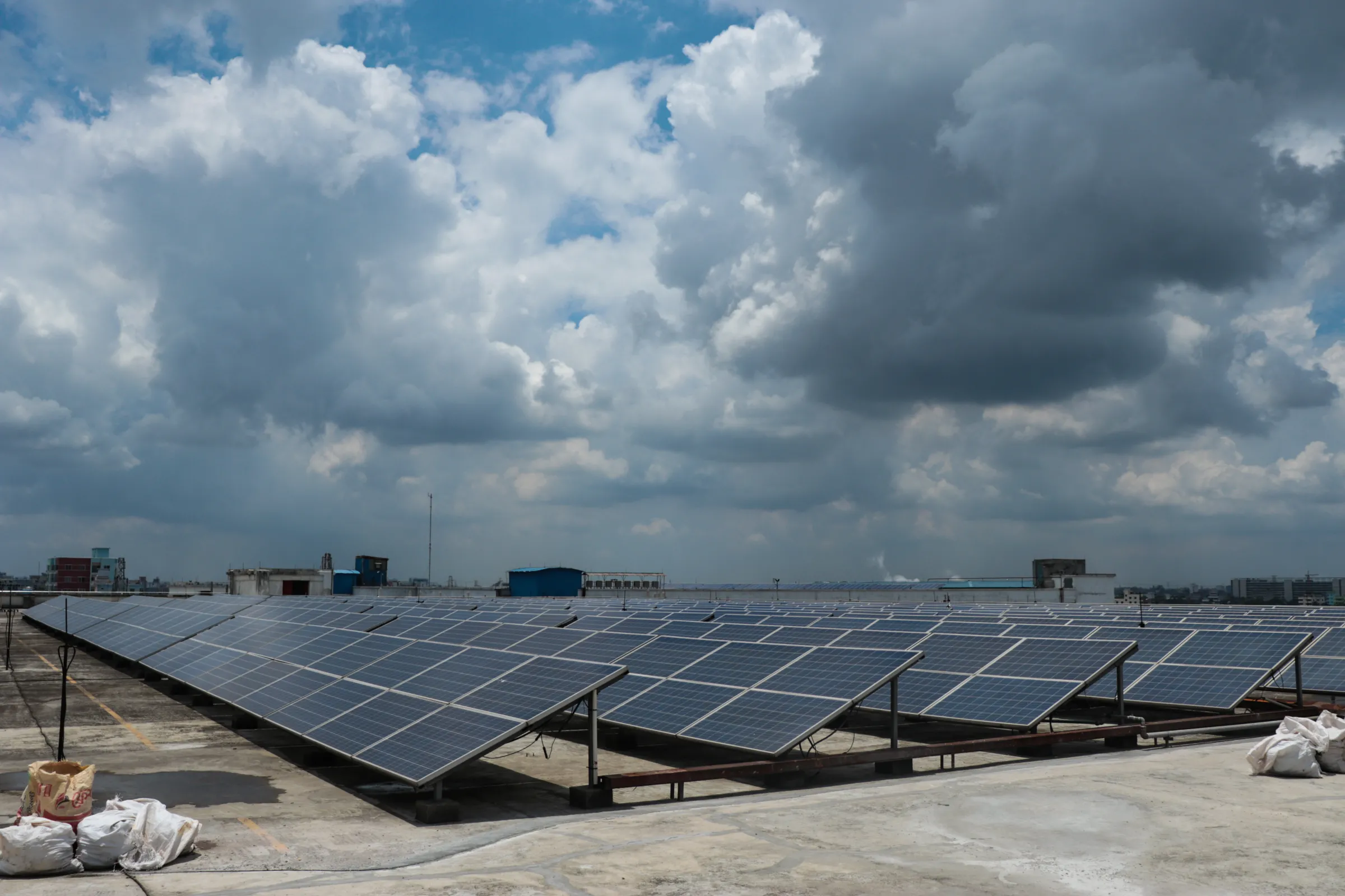 Solar panels situated on the rooftop of a Bangladeshi textile factory