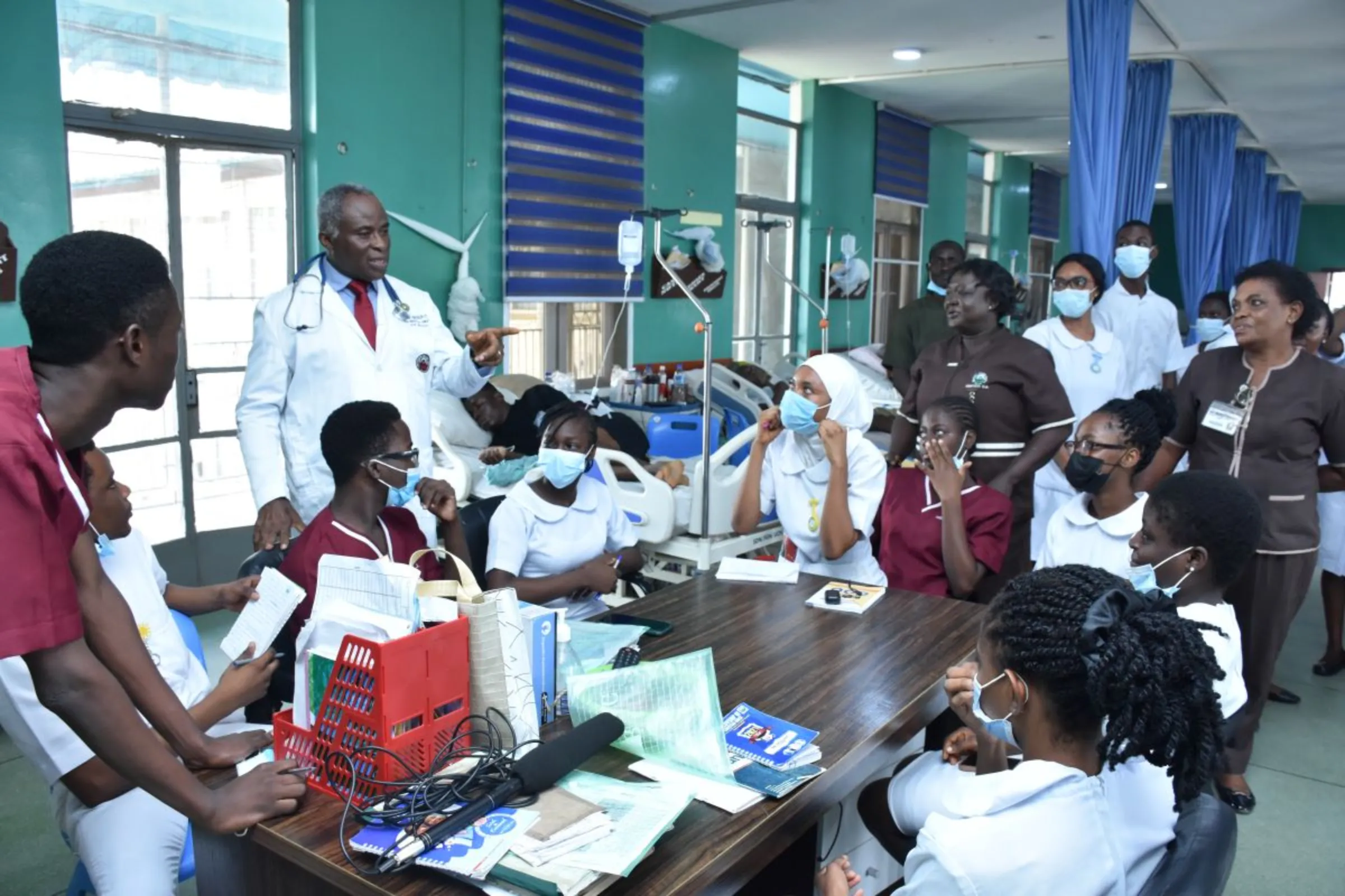 Chief Medical Director, University Teaching College Hospital, Ibadan in Nigeria Prof. Jesse Omotegbayo holds regular townhall meetings with nurses at the specialist hospital to address concern. Bukola Adebayo/Thomson Reuters Foundation.