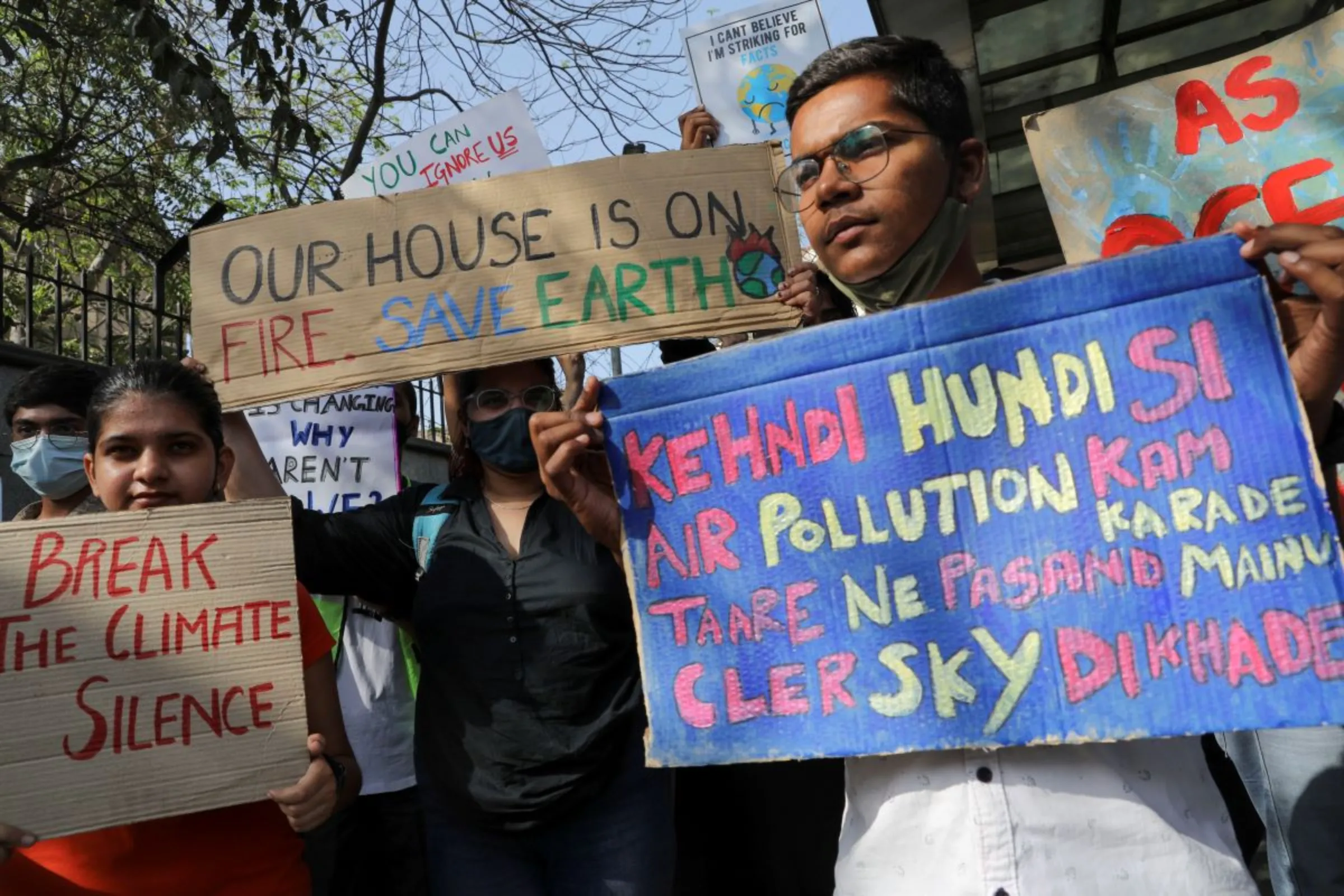 People take part in a 'Global Climate Strike' march towards the Delhi Secretariat building in New Delhi, India, March 25, 2022. REUTERS/Anushree Fadnavis