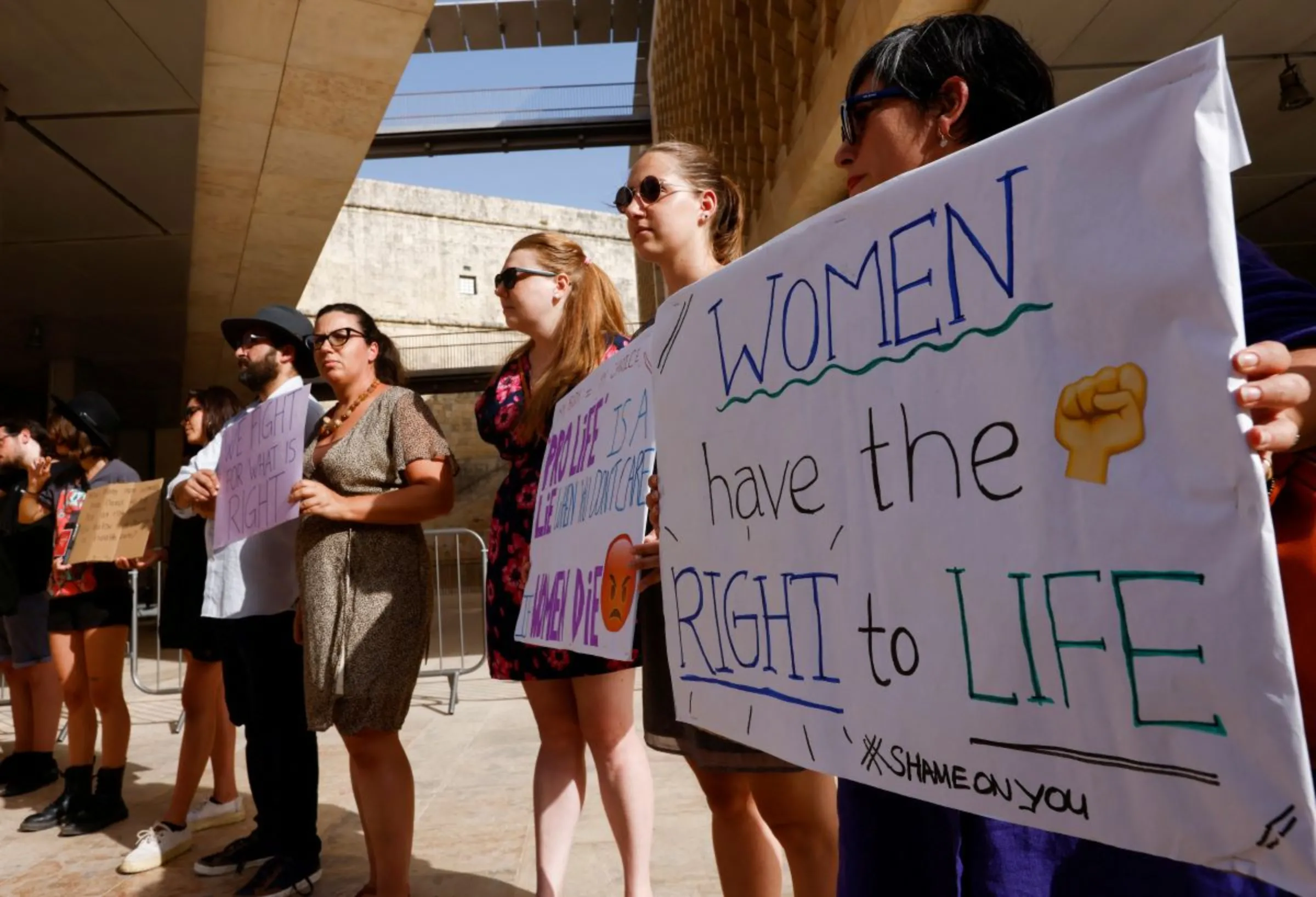 People demonstrate against Malta's total ban on abortion outside Parliament House in Valletta, Malta, June 22, 2022