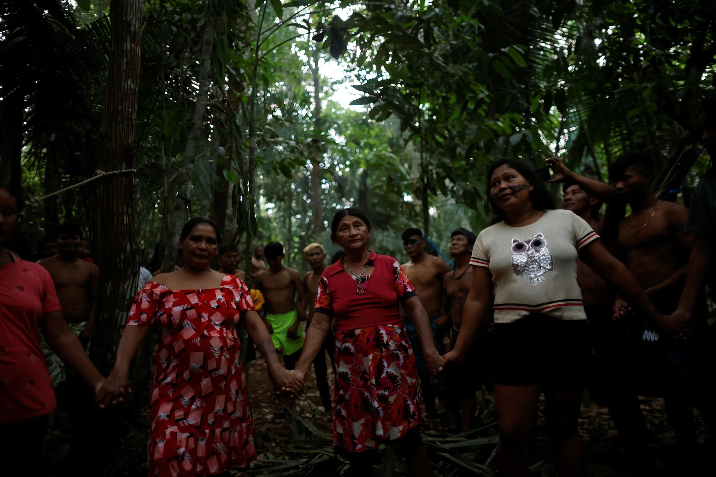 Munduruku Indigenous women perform a ritual dance to thank the spirits of the forest in the Amazon rainforest, the Sawre Muybu Indigenous Territory, in Itaituba municipality, Para state, Brazil, July 20, 2024. REUTERS/Adriano Machado