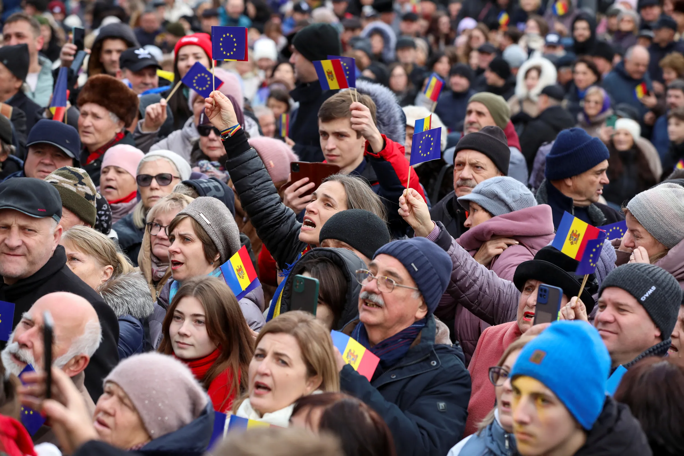 People gather to celebrate the European Union's decision to open membership talks with Moldova during a rally and concert in Chisinau, Moldova, December 17, 2023. REUTERS/Vladislav Culiomza