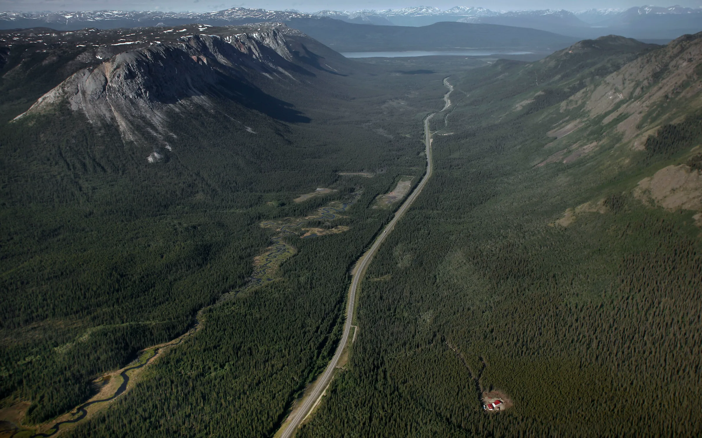 The Alaska Highway is surrounded by boreal forest running north towards Whitehorse, Yukon in this file photo taken June 21, 2007
