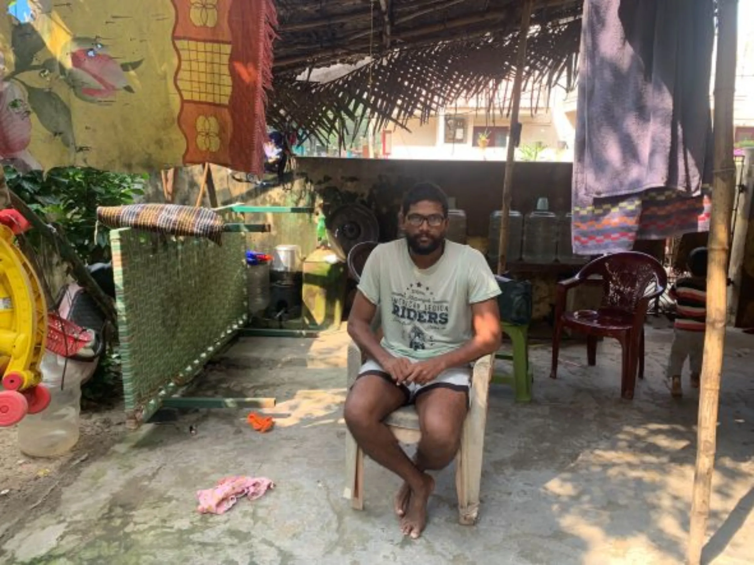 R. Bhagyaraj, 35, poses for a picture in his wife’s family home in Chennai, India, November 29, 2022. Thomson Reuters Foundation/Anuradha Nagaraj