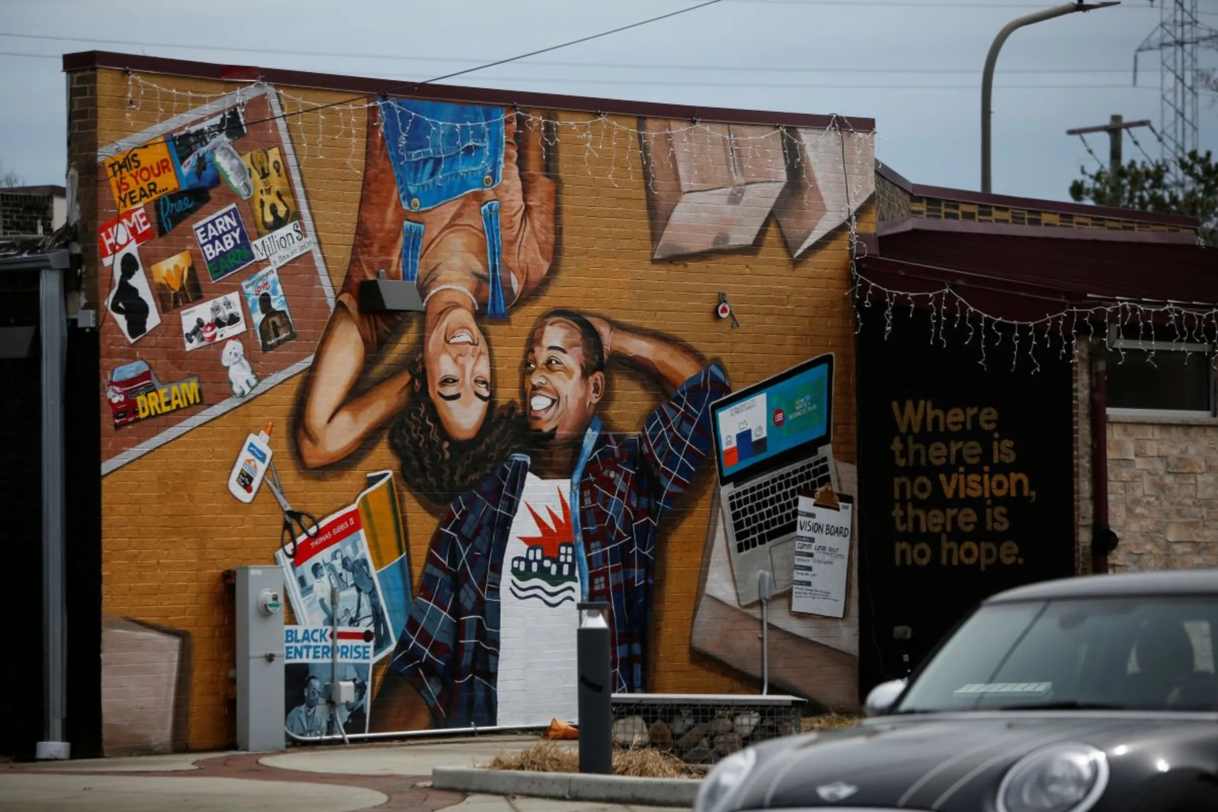 A mural is displayed on Litehouse Whole Food Grill on Dodge Avenue in the Fifth Ward, known as the historic Black community, in Evanston, Illinois, U.S., March 18, 2021. REUTERS/Eileen T. Meslar