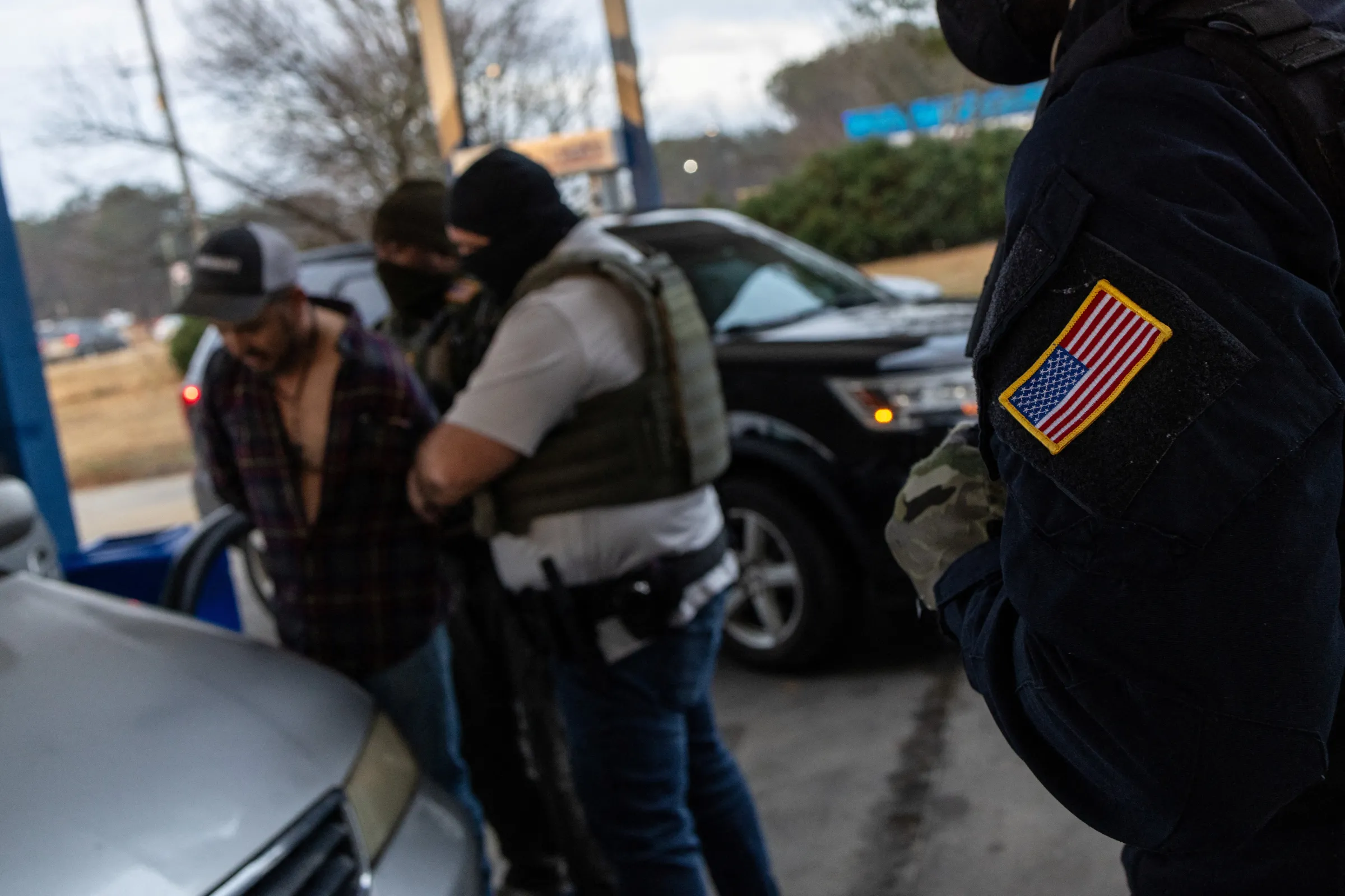 A man with three convictions for driving under the influence, is arrested by federal law enforcement agents led by U.S. Immigration and Customs Enforcement in Rex, south of Atlanta, Georgia, February 5, 2025. REUTERS/Carlos Barria