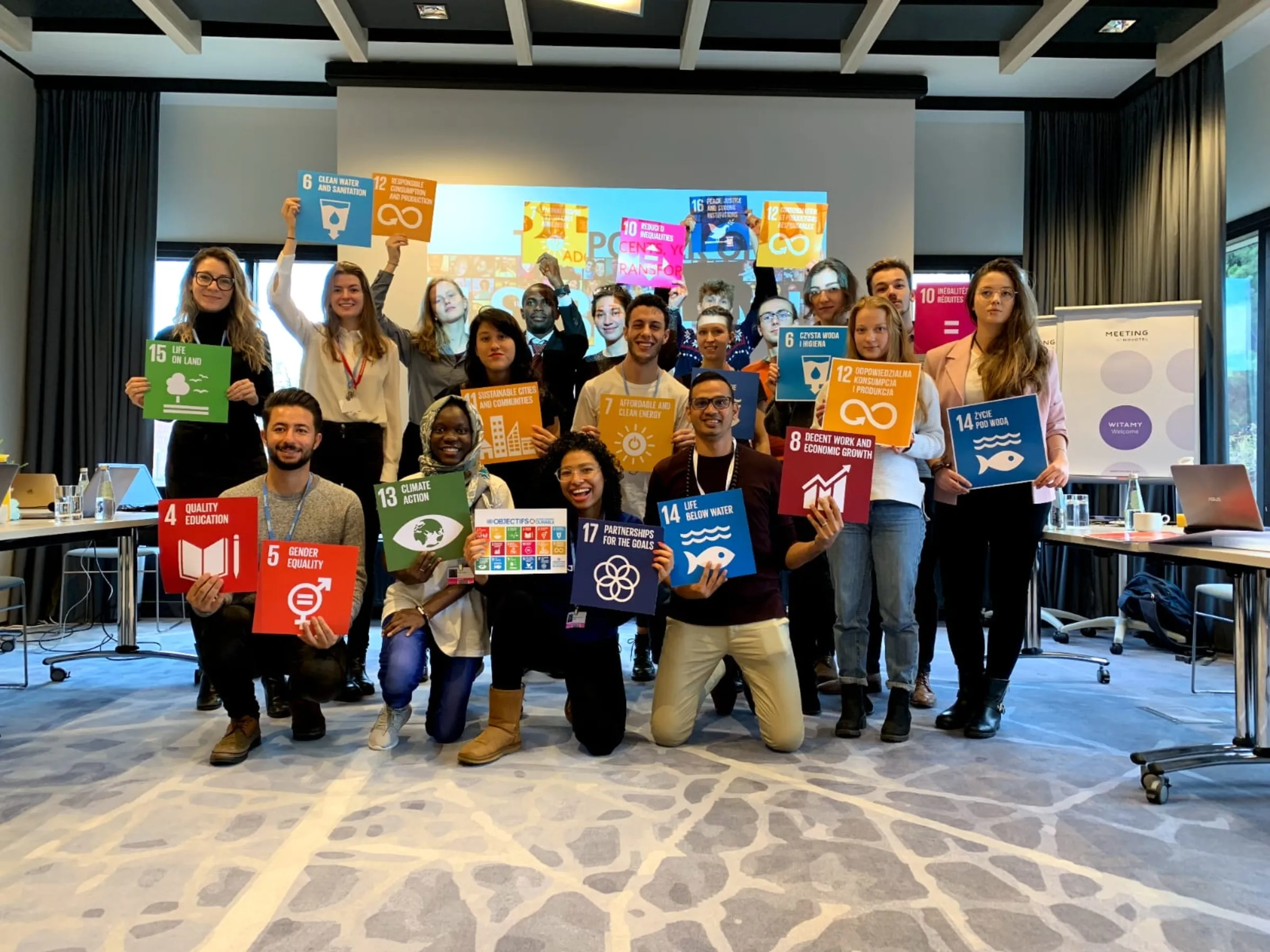 Sivendra Michael (front row, right), who will negotiate for Fiji at the COP27 U.N. climate talks in Egypt, poses with other SDG activists at a panel discussion on Youth and SDGs, in Bonn, Germany, 2017. Sivendra Michael/Handout via Thomson Reuters Foundation