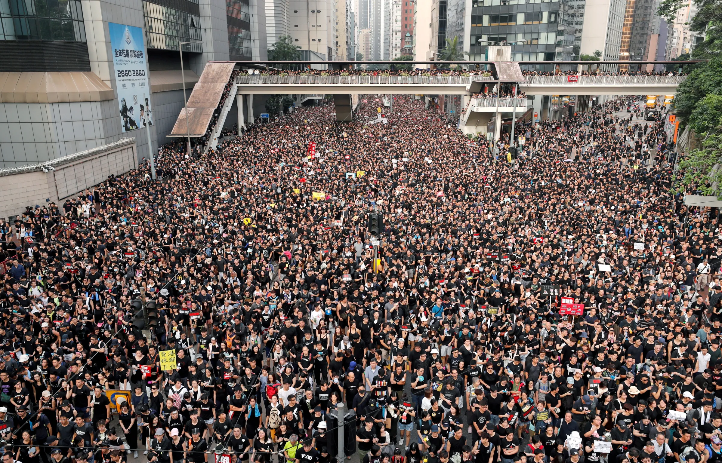 Protesters attend a demonstration demanding Hong Kong's leaders step down and withdraw the extradition bill, in Hong Kong, China, June 16, 2019. REUTERS/Tyrone Siu