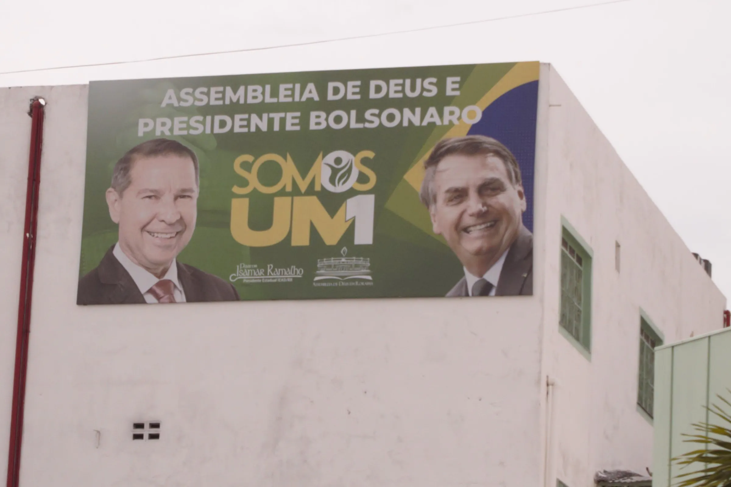 Billboard supportive of Presidency reelection candidate Jair Bolsonaro with his picture and evangelical priest Pastor Ramalho hanging with the saying 'Assembly of God and President Bolsonaro - We are One', in Boa Vista, Brazil, October, 25, 2022. Thomson Reuters Foundation/André Cabette Fábio