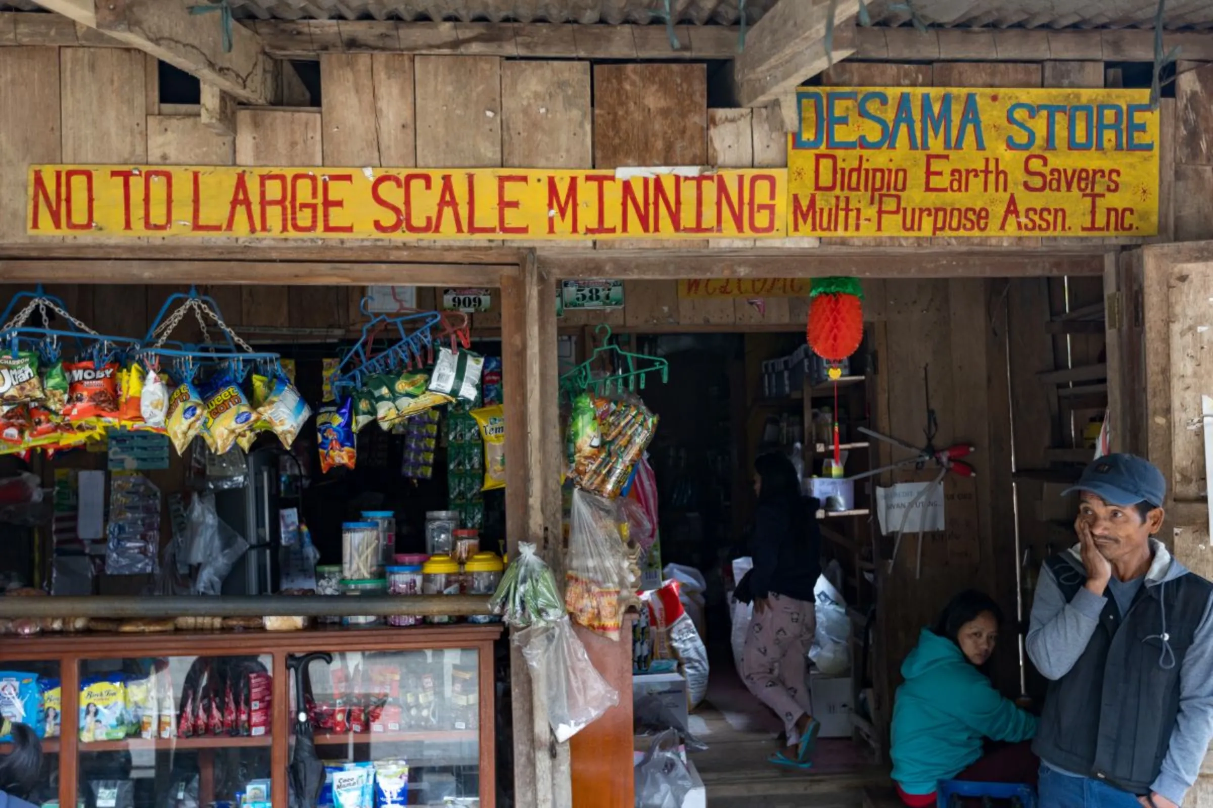 Anti-mining slogans displayed at a store run by a community group pushing for the closure of a mine in Didipio, the Philippines. Thomson Reuters Foundation/ Kathleen Lei Limayo