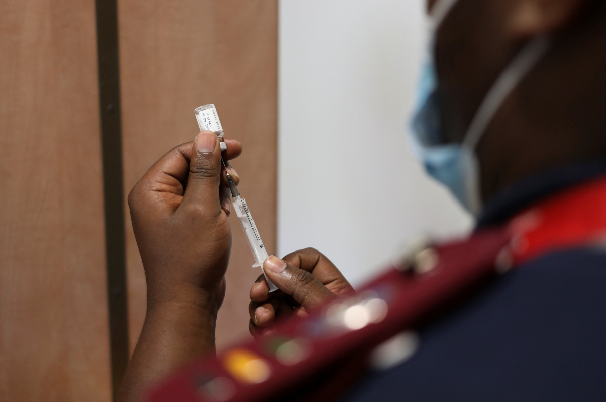 A nurse prepares a dose of the of coronavirus disease (COVID-19) in Dutywa