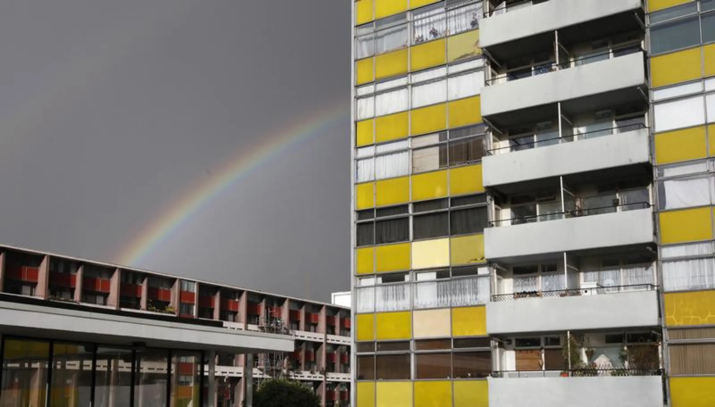 A rainbow appears over a housing estate in east London, March 3, 2014. REUTERS/Suzanne Plunket