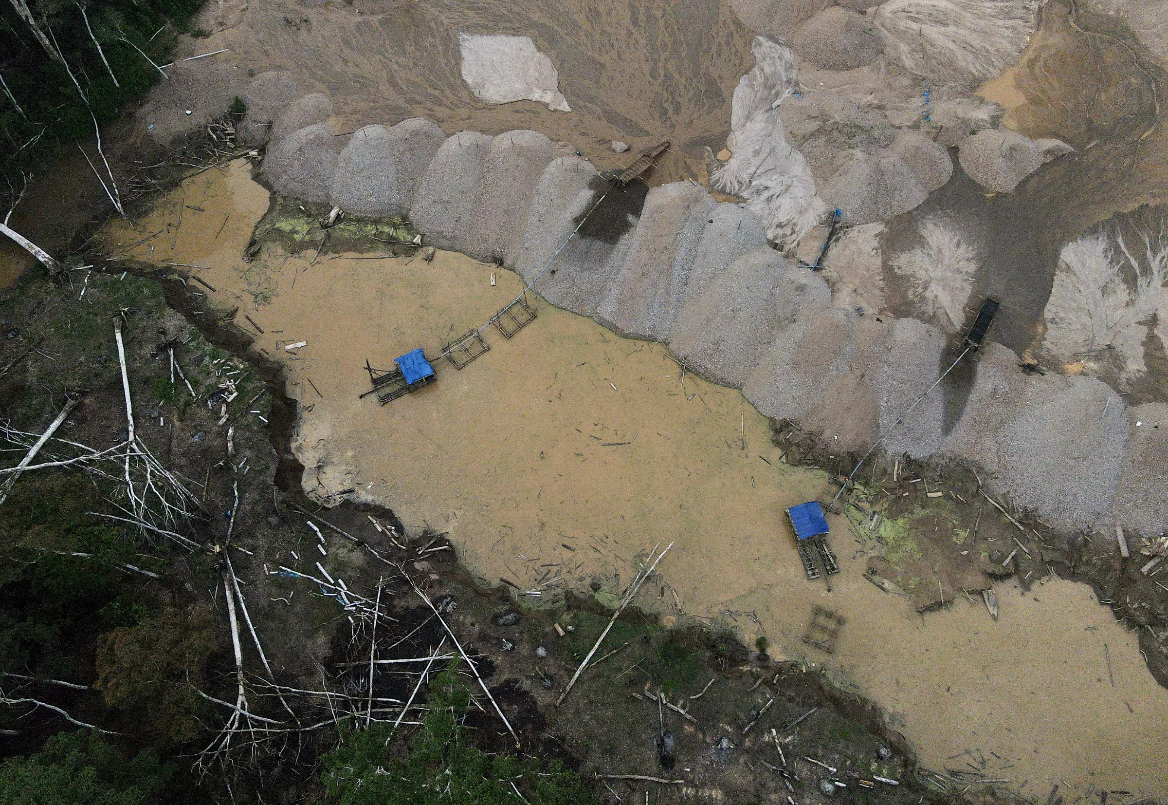 A site used for informal gold mining is pictured in Los Amigos, in the Madre de Dios region, Peru May 22, 2023. REUTERS/Alessandro Cinque