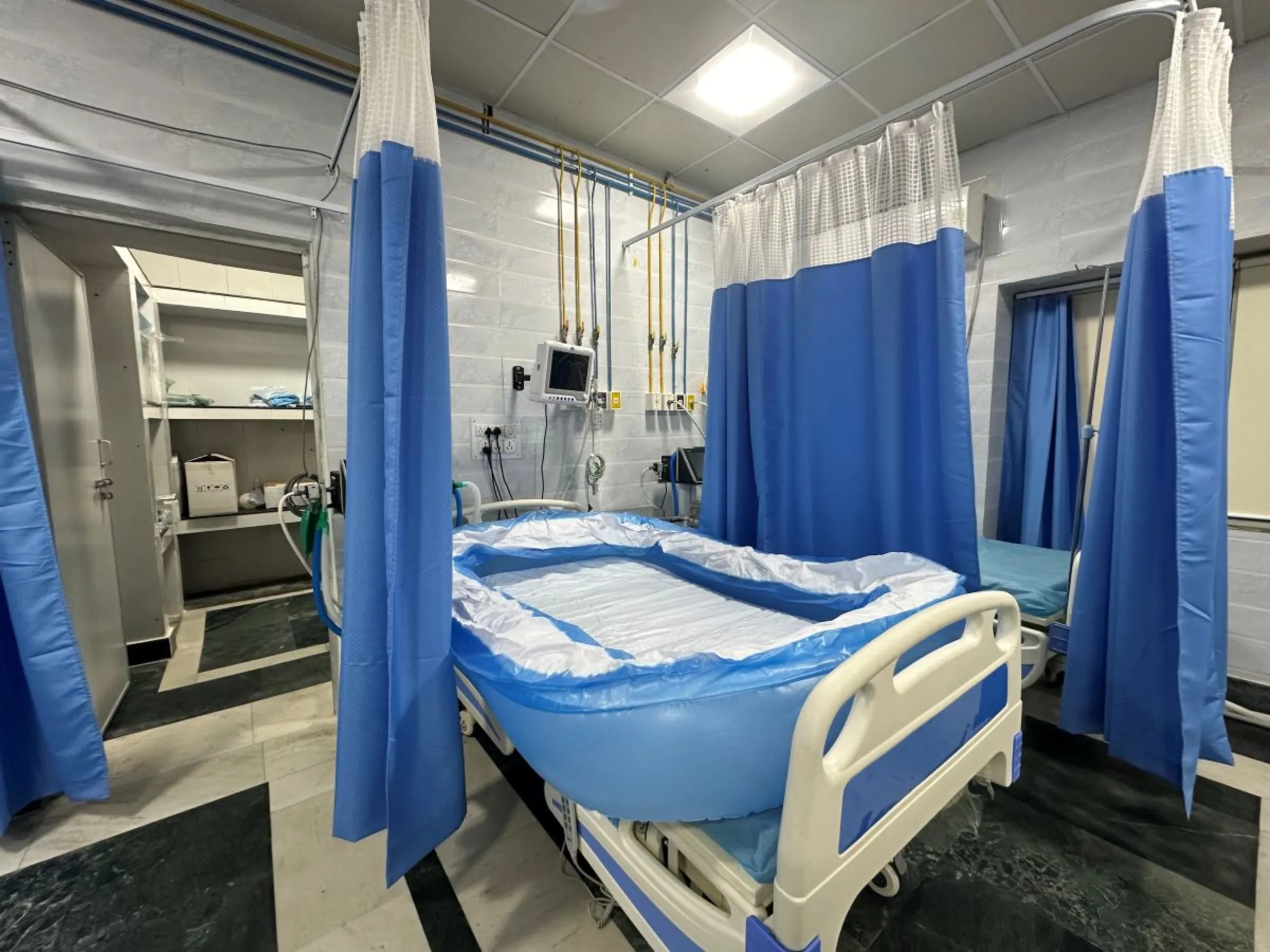 Ventilators and inflatable beds used to treat heatstroke patients at Ram Manohar Lohia hospital in Delhi, India. June 13, 2024. Thomson Reuters Foundation/Bhasker Tripathi