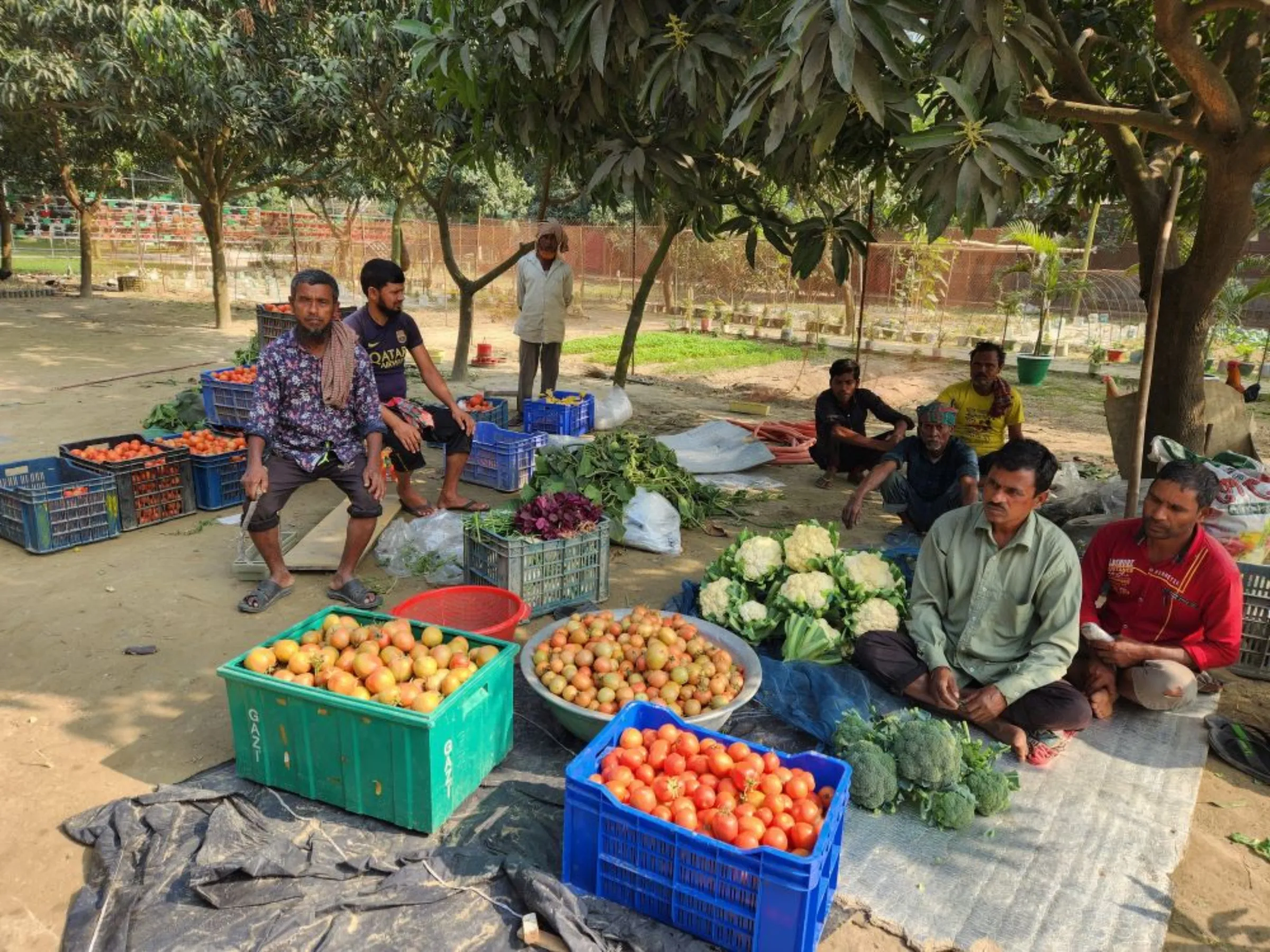 Workers sell pesticide-free vegetables at low-cost at a Snowtex Outerwear garment factory in Dhamrai, Bangladesh, January 30, 2023