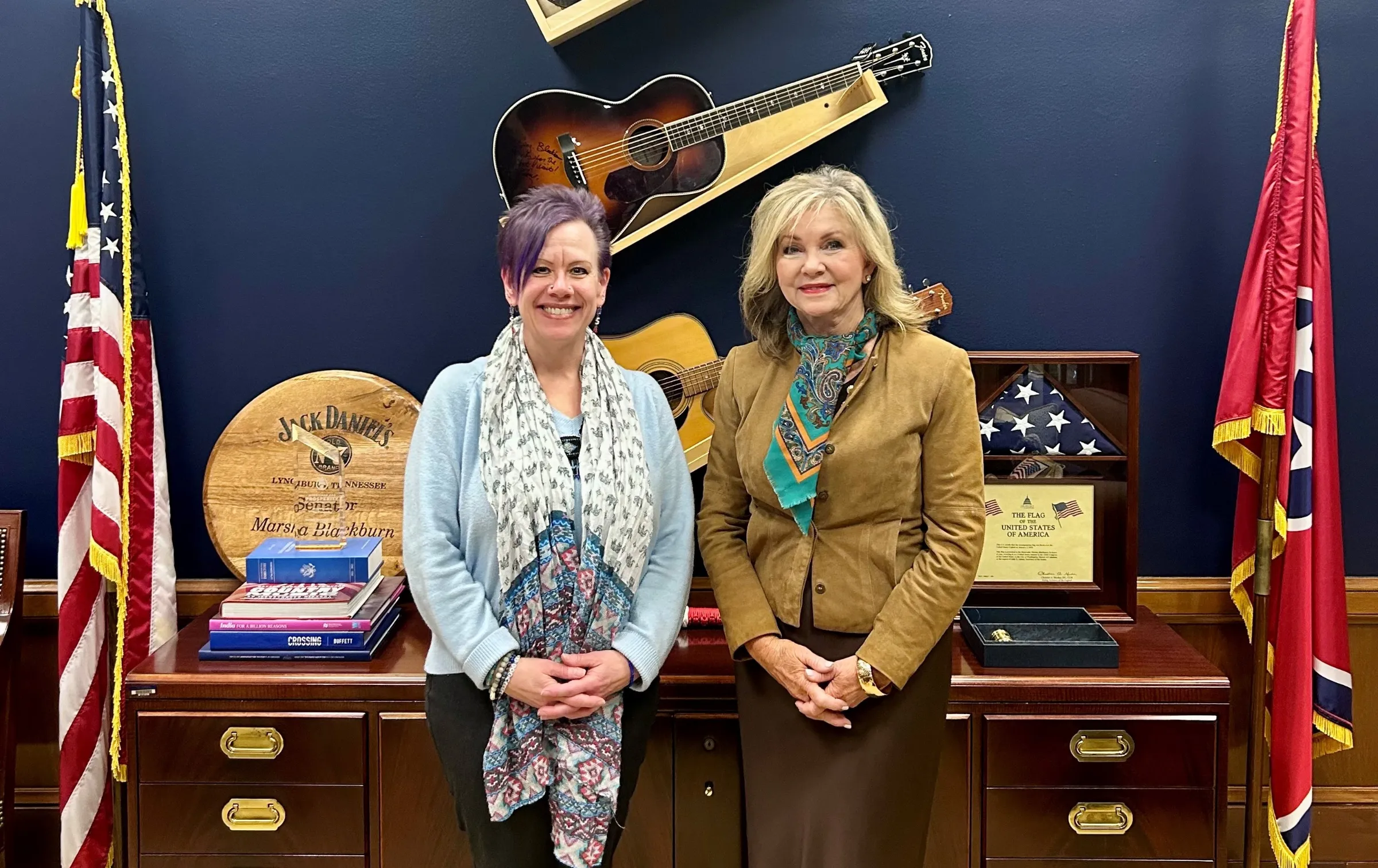 Beth Hyland poses for a photo alongside Senator Marsha Blackburn in the Capitol to show her support for the proposed Romance Scam Prevention Act, March 12, 2025. Washington, United States. Beth Hyland/Handout via Thomson Reuters Foundation