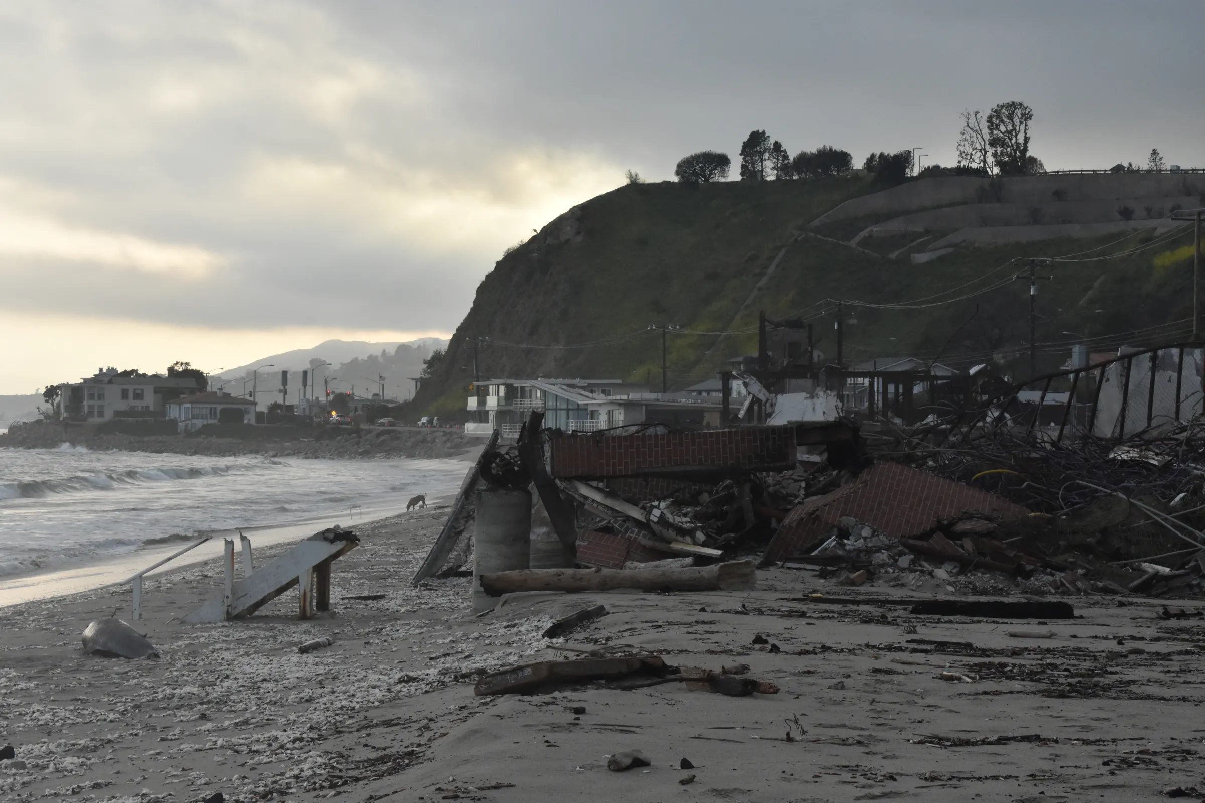 The edges of destroyed property on La Costa Beach, where the Zoloths’ family home was, is at the high tide line even on a calm day, April 21, 2025. Rachel Parsons/Thomson Reuters Foundation